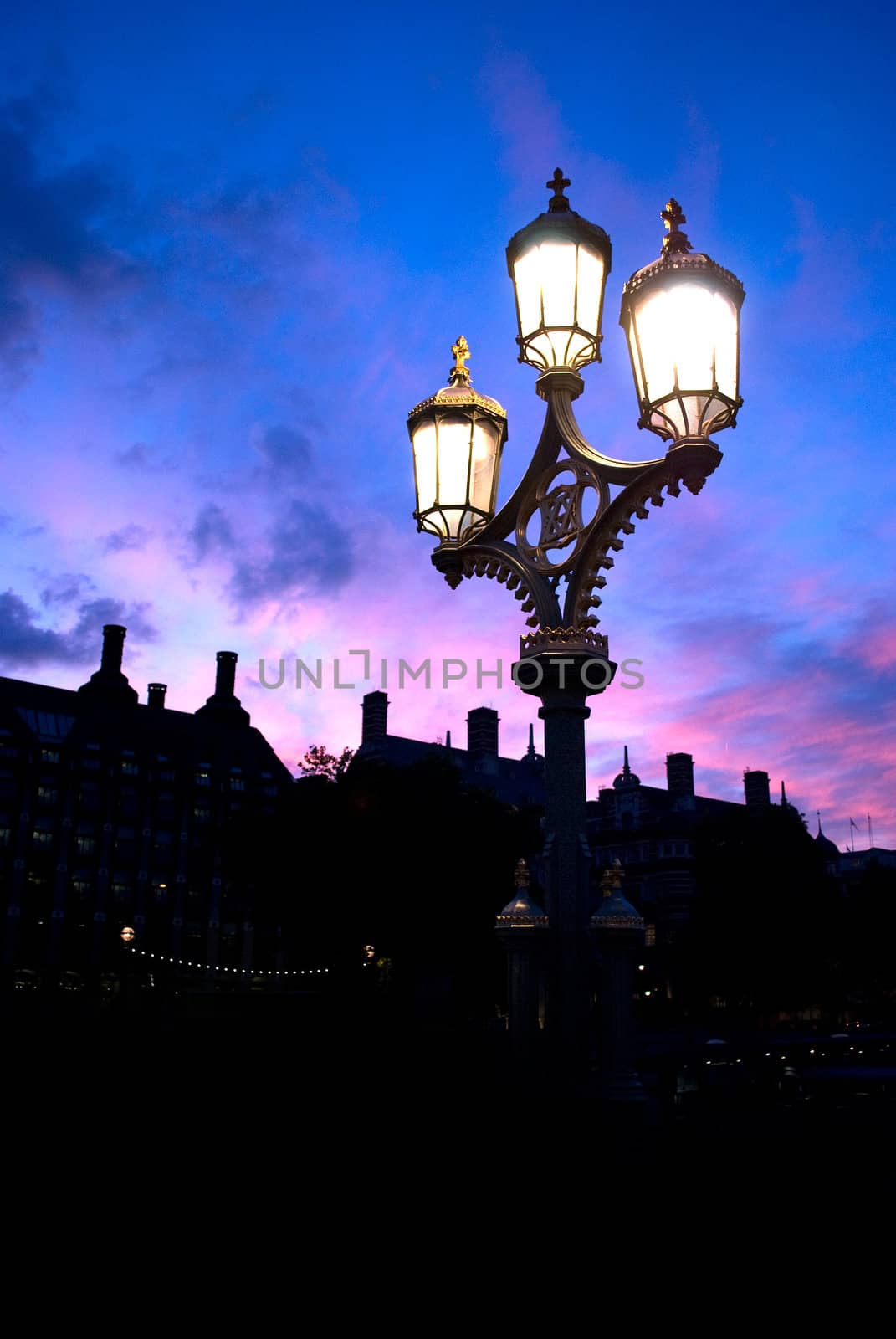 beautiful romantic street lamp at sunset in London