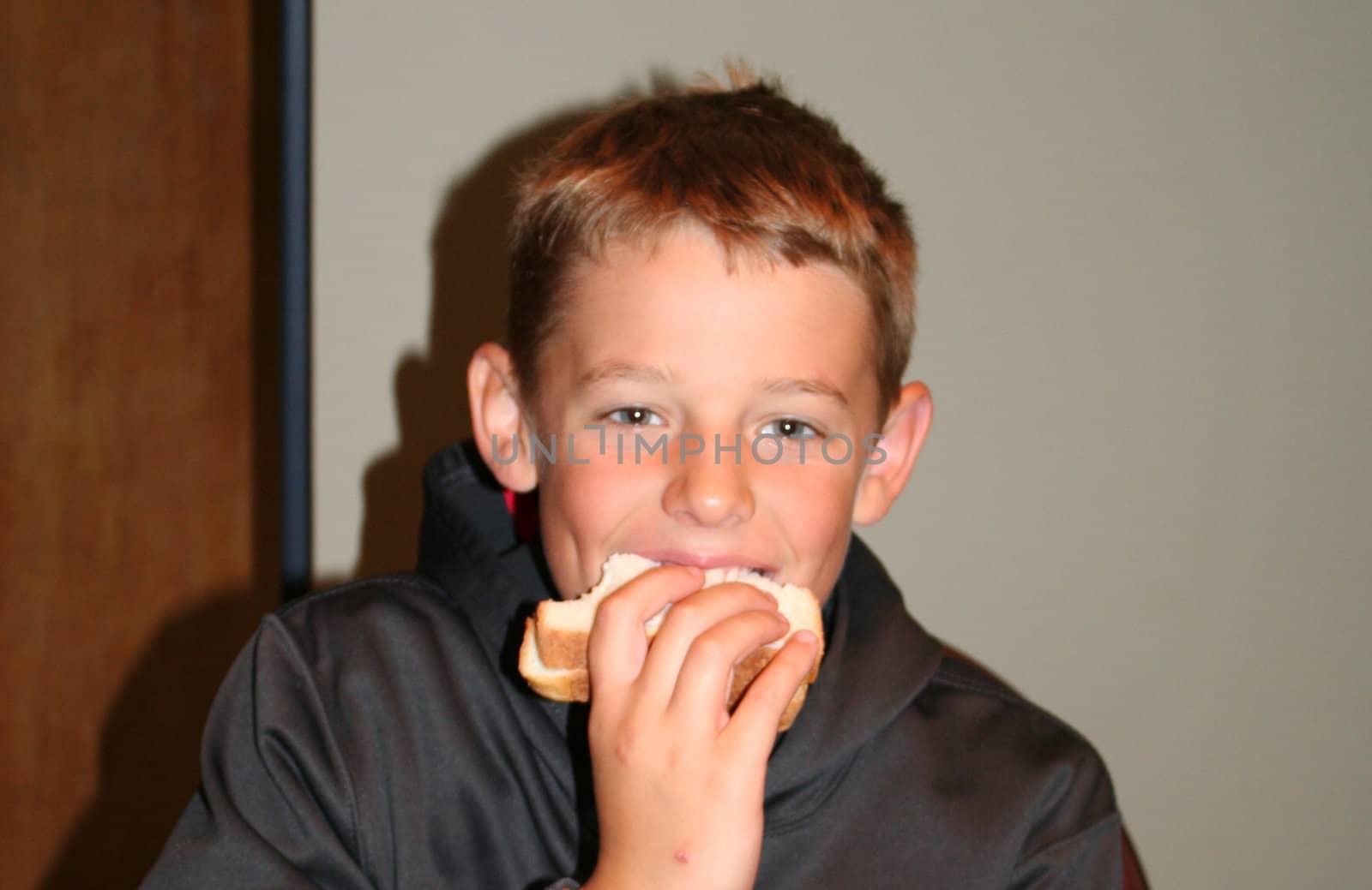 Young boy eating