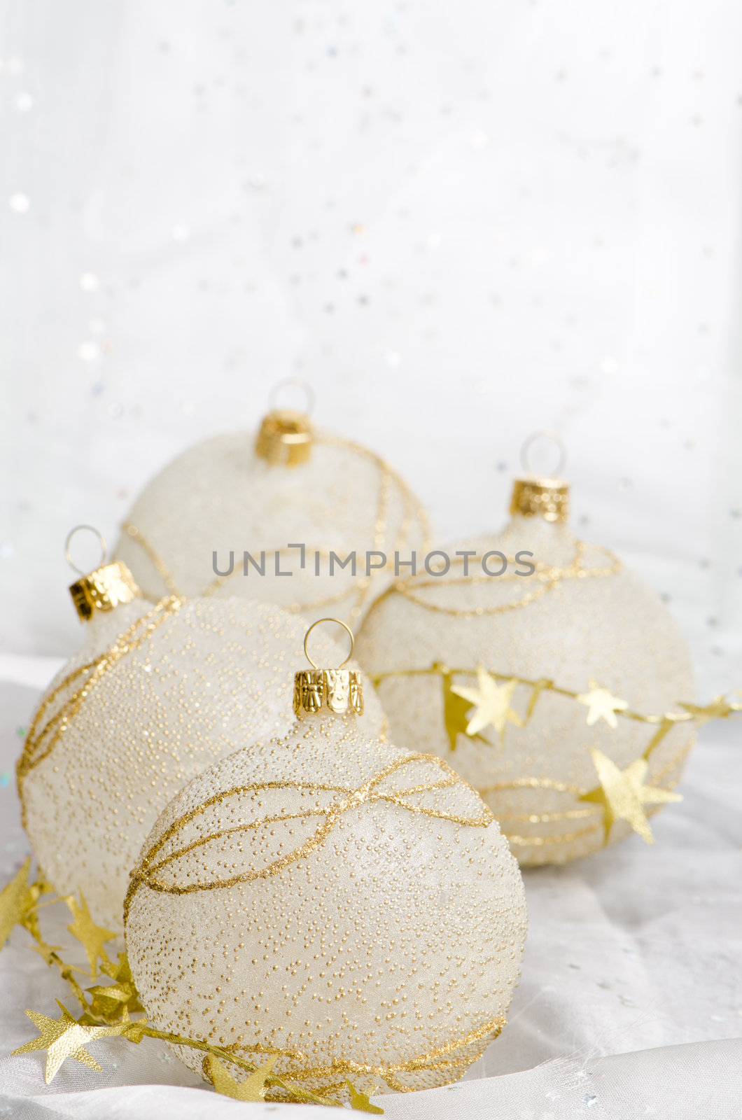 Christmas ball baubles with silver and gold decoration.