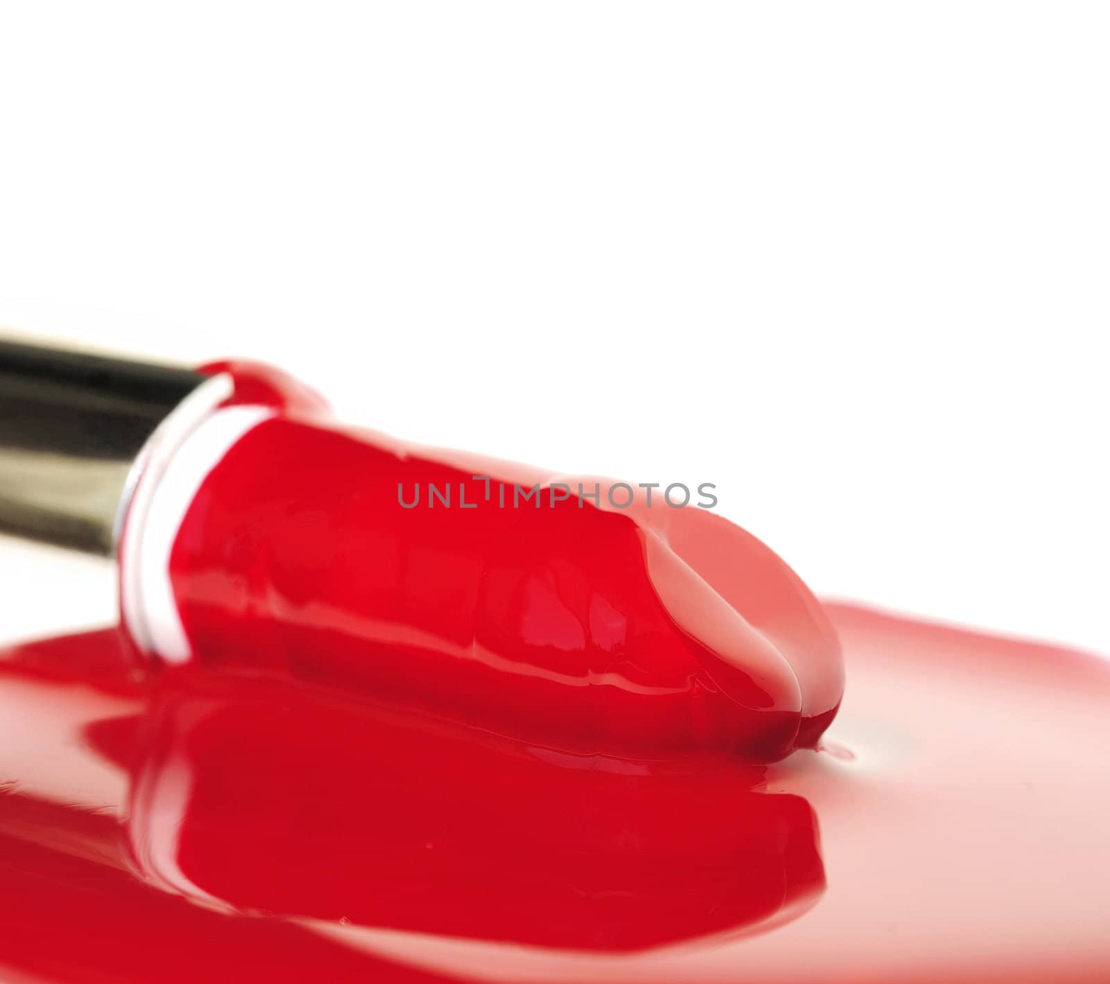 Lipsticks on red liquid . by POMACHKA
