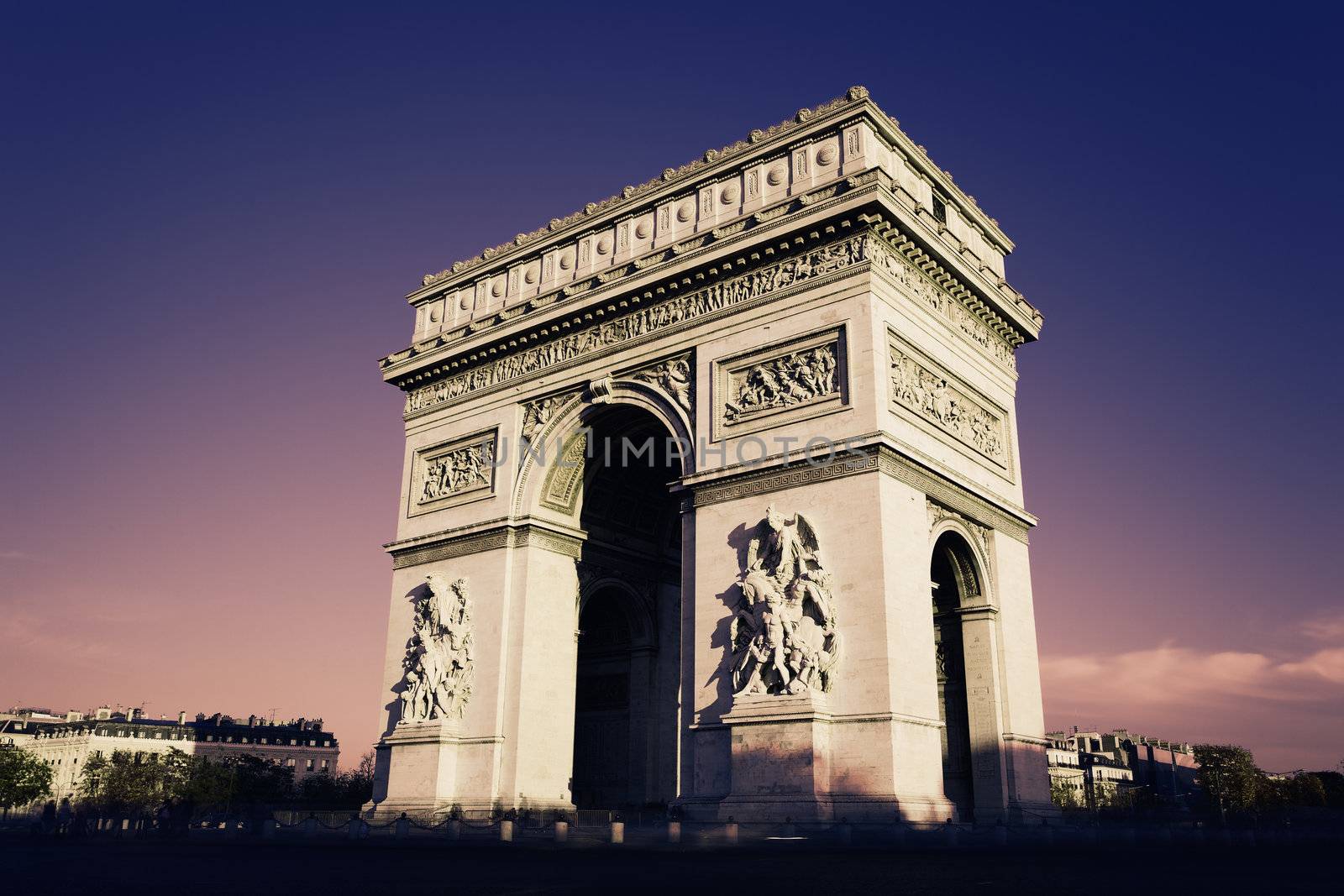 Paris, Arc de Triomphe in the evening
