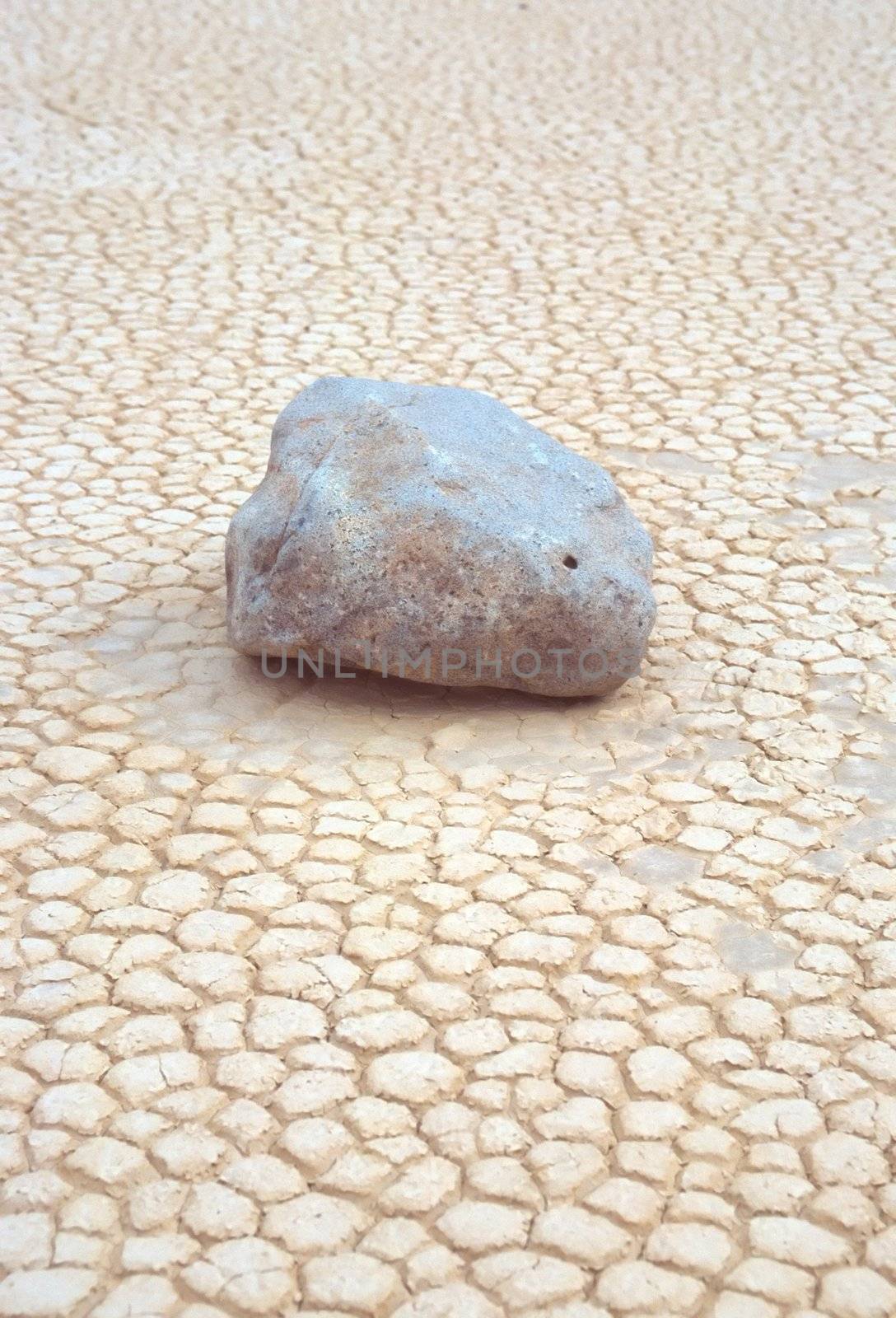 Racetrack Playa is a seasonally dry lake (a playa) located in the northern part of the Panamint Mountains in Death Valley National Park, California, U.S.A.. It is famous for 'sailing stones', rocks that mysteriously move across its surface.