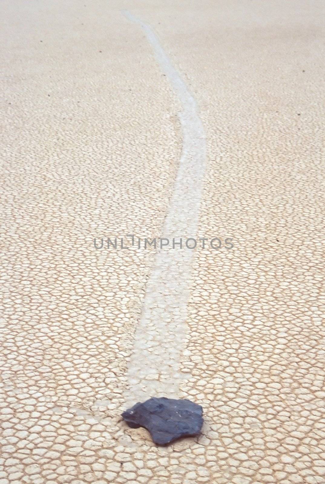 Racetrack Playa is a seasonally dry lake (a playa) located in the northern part of the Panamint Mountains in Death Valley National Park, California, U.S.A.. It is famous for 'sailing stones', rocks that mysteriously move across its surface.