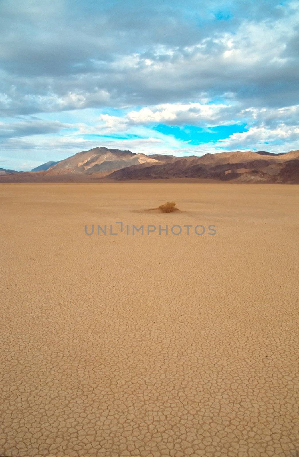 Racetrack Playa is a seasonally dry lake (a playa) located in the northern part of the Panamint Mountains in Death Valley National Park, California, U.S.A.. It is famous for 'sailing stones', rocks that mysteriously move across its surface.