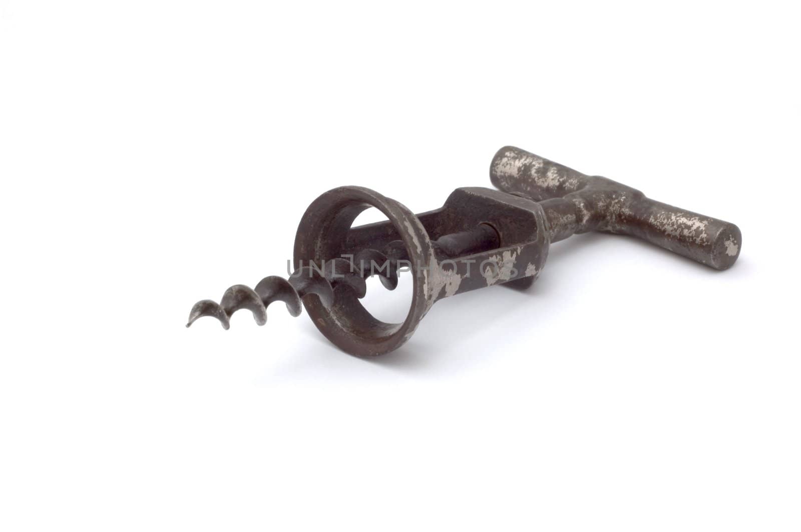 an old corkscrew on white background