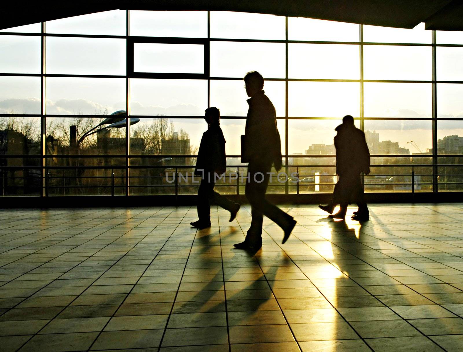 City people walking in a futuristic tunnel     