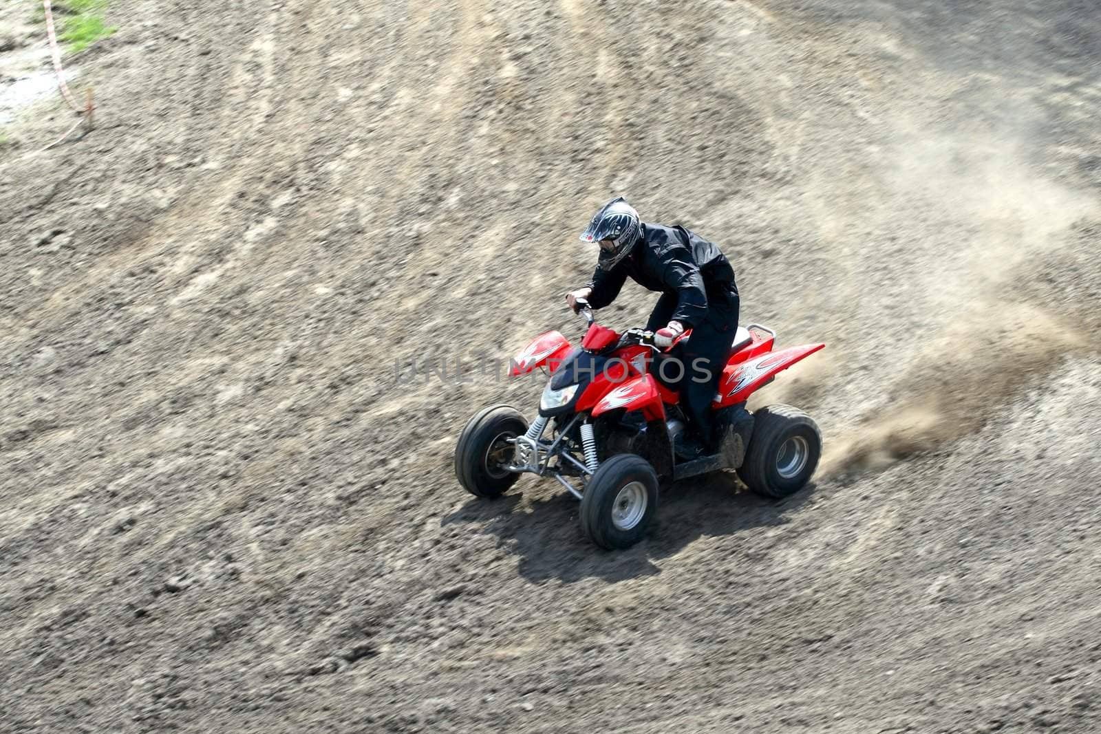 Man on quad bike during a race