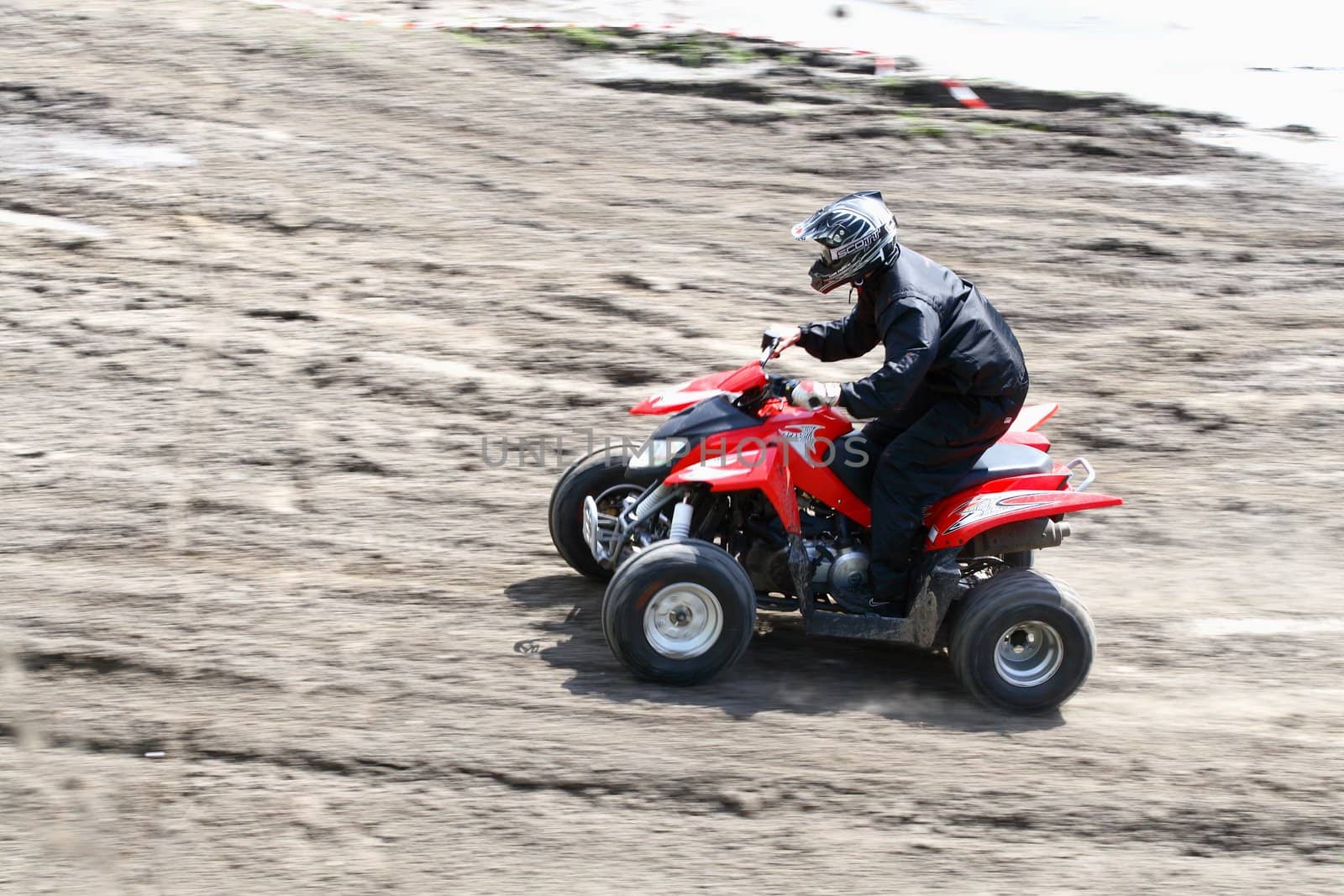 Man on quad bike during a race