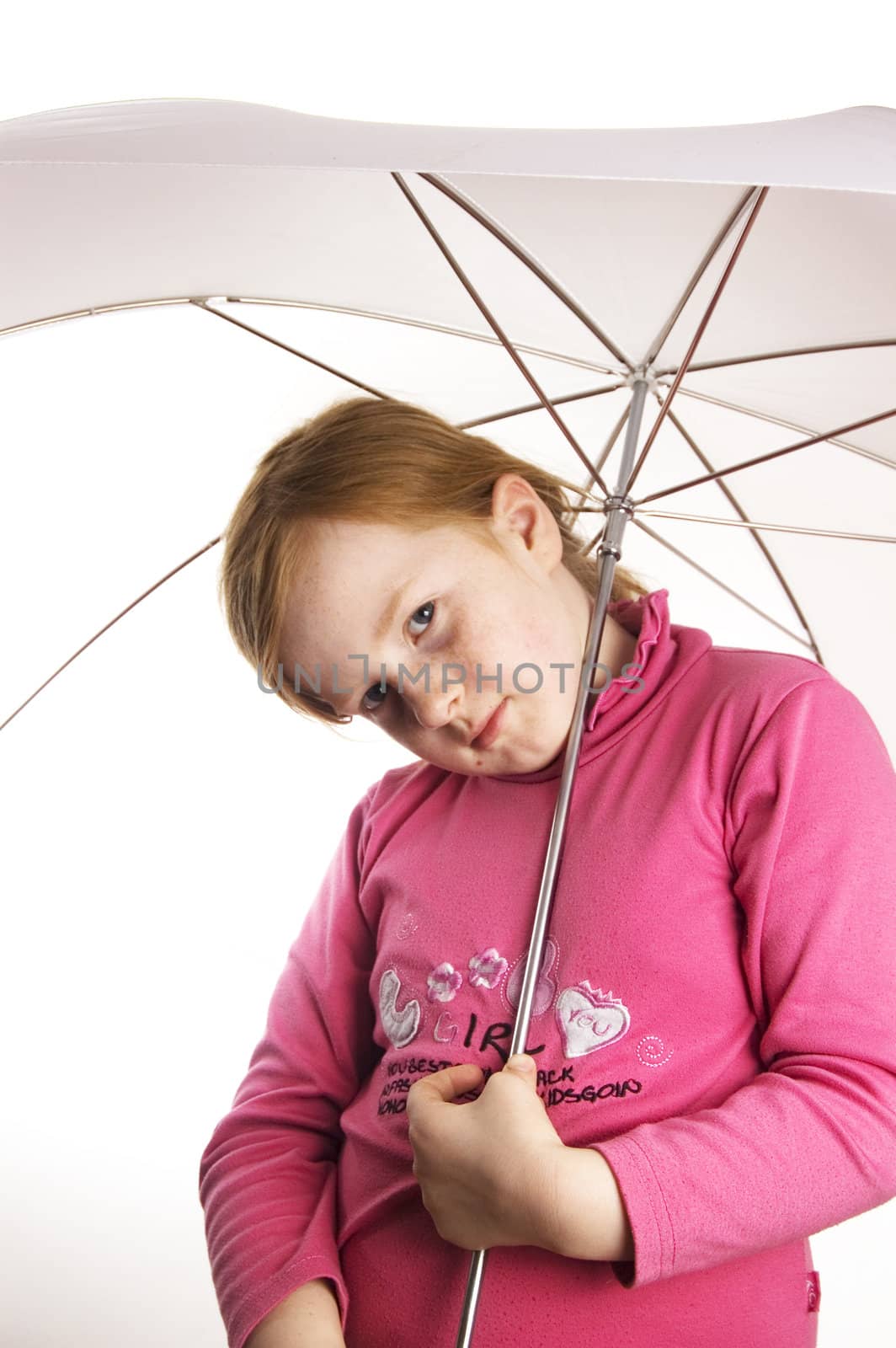 little girl holding a white umbrella