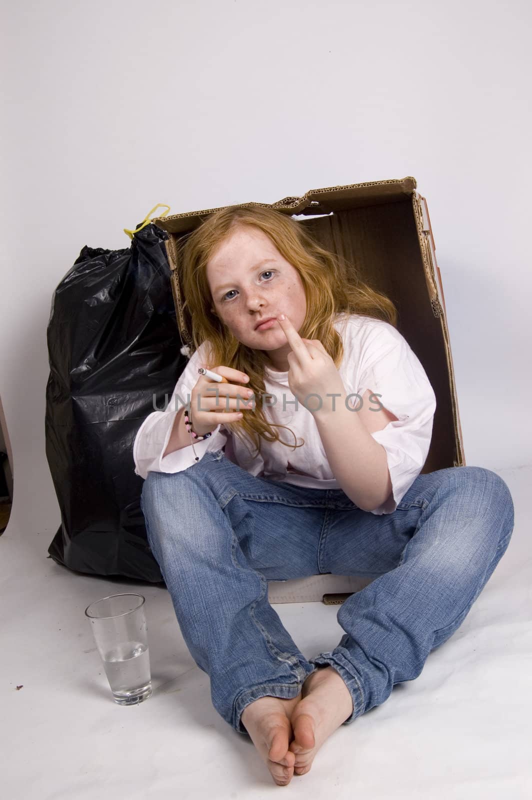 homeless girl showing the middle finger