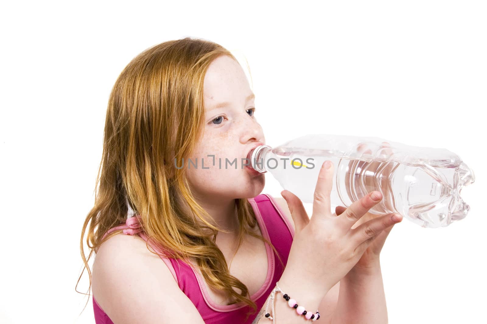 Portrait of a little young girl drinking water by ladyminnie