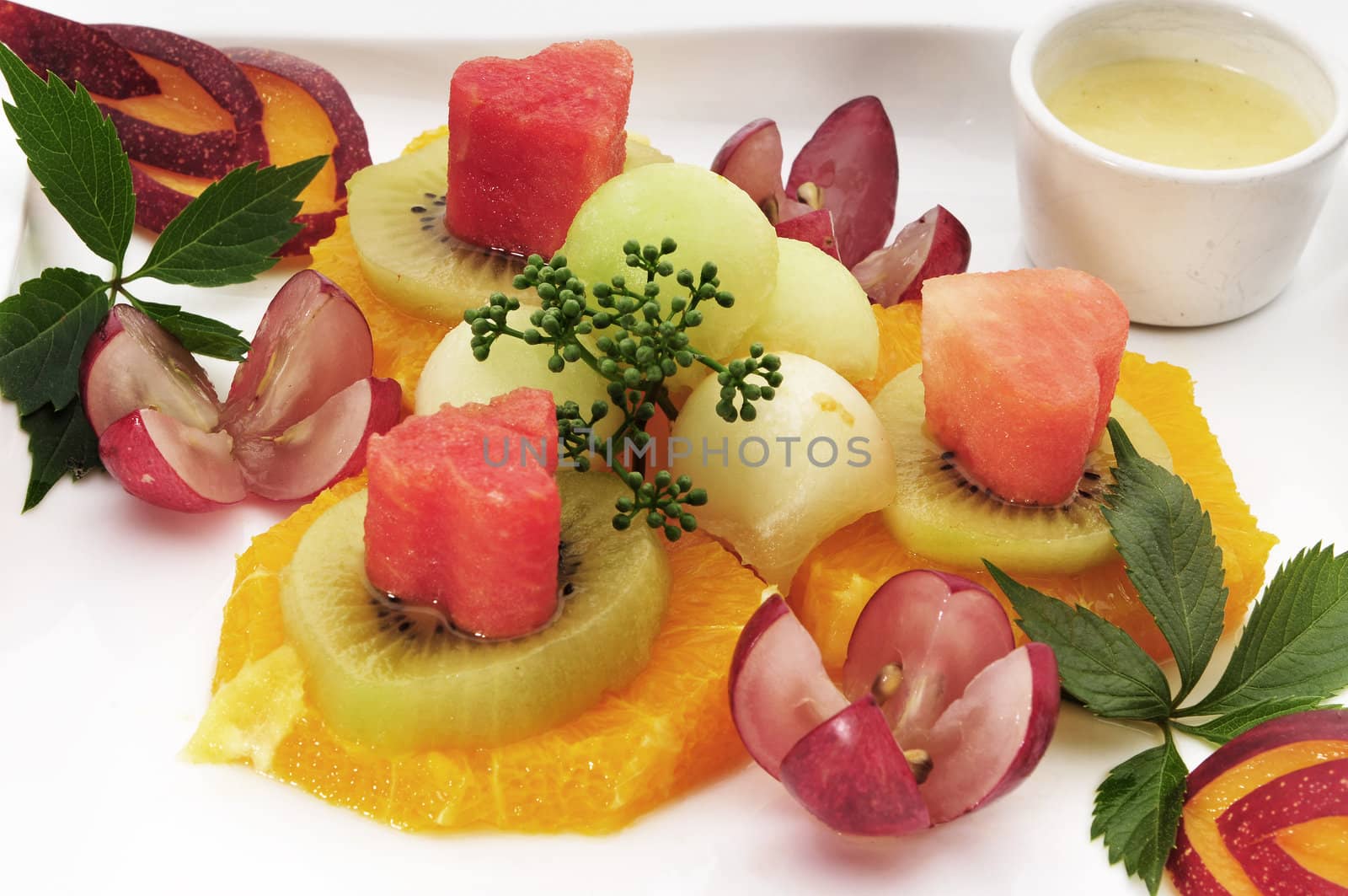 Nice healthful, fresh fruits composition on the plate