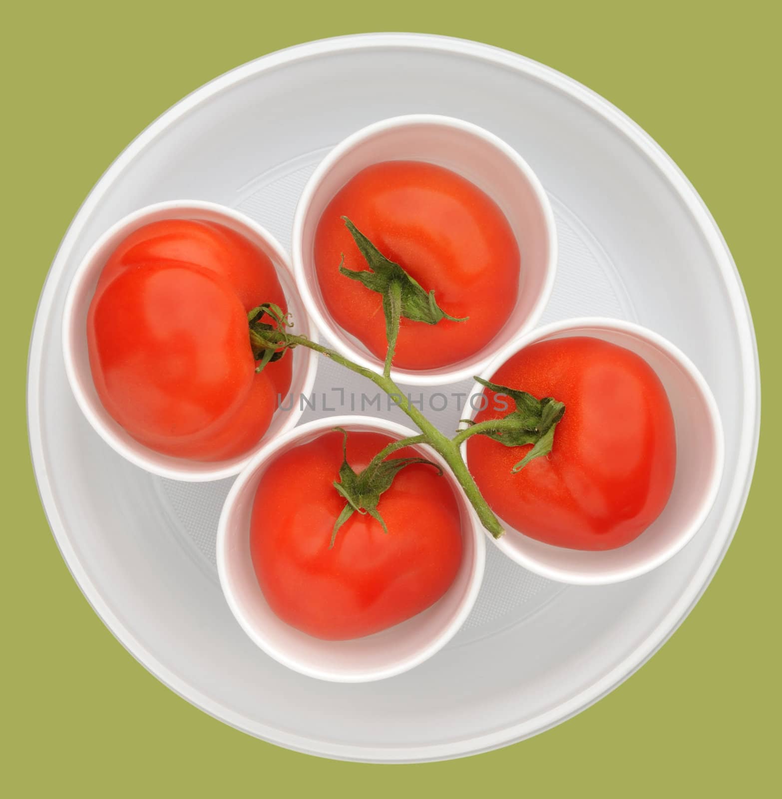 Nice red tomato, fruits in white beakers, clipping path