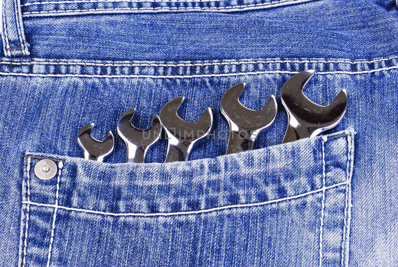 Blue jeans pocket with wrenches by caldix