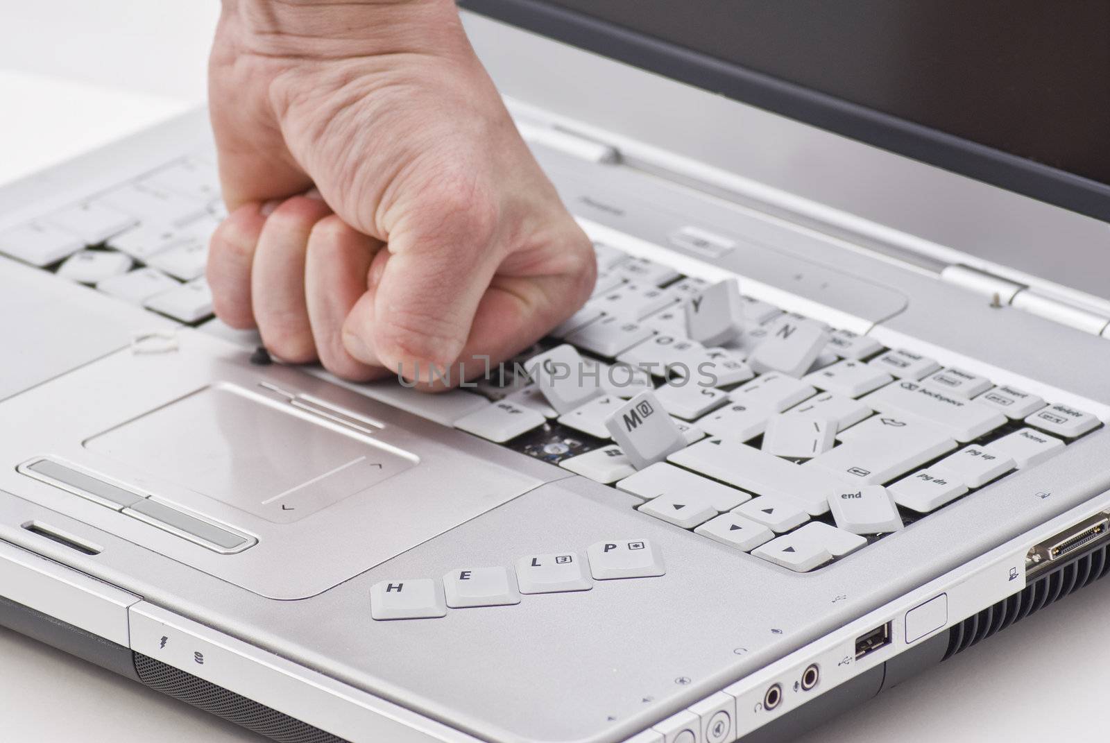 By hand damaged laptop on white background with "help" word 