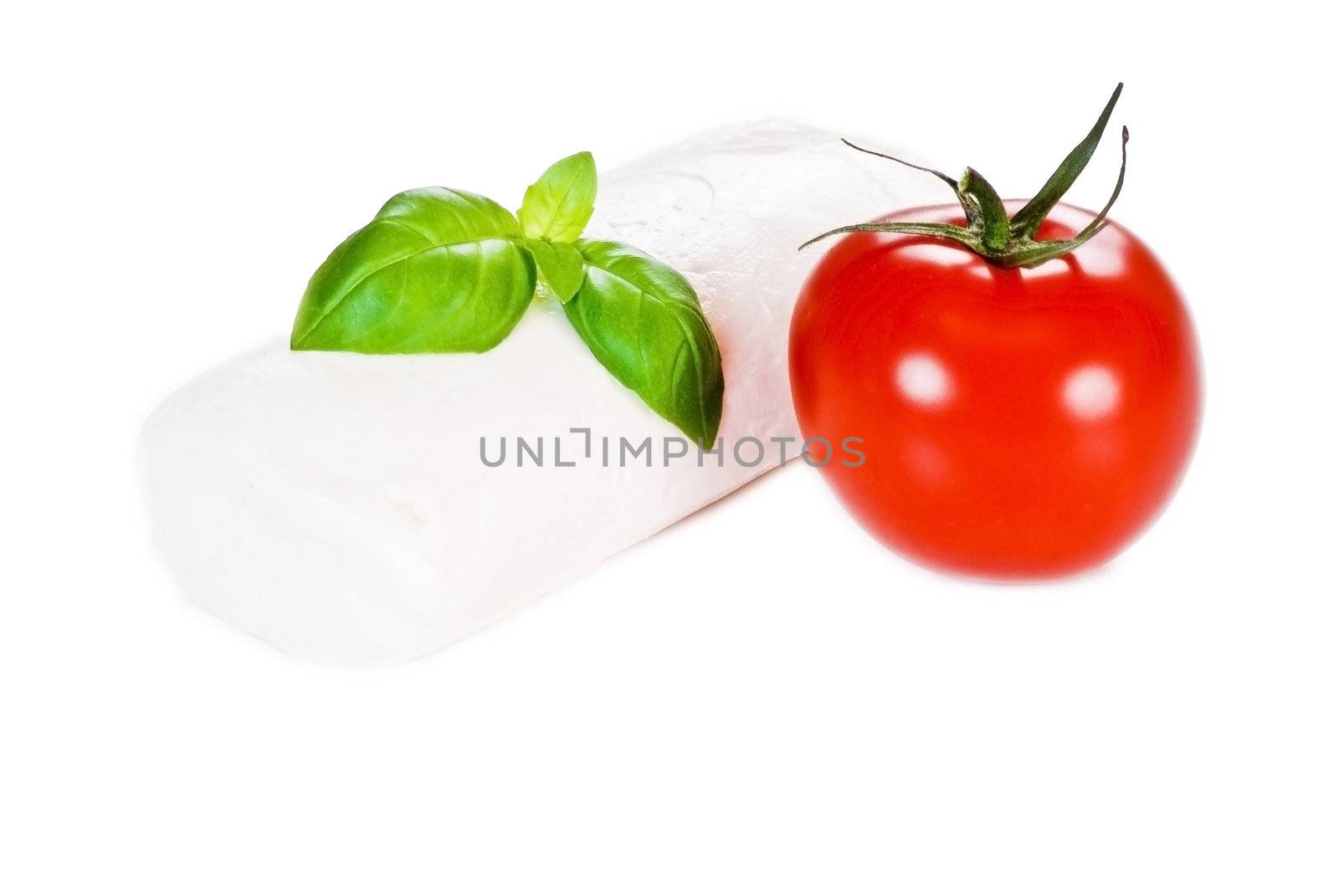 Fresh tomato, basil and mozzarella cheese on white background