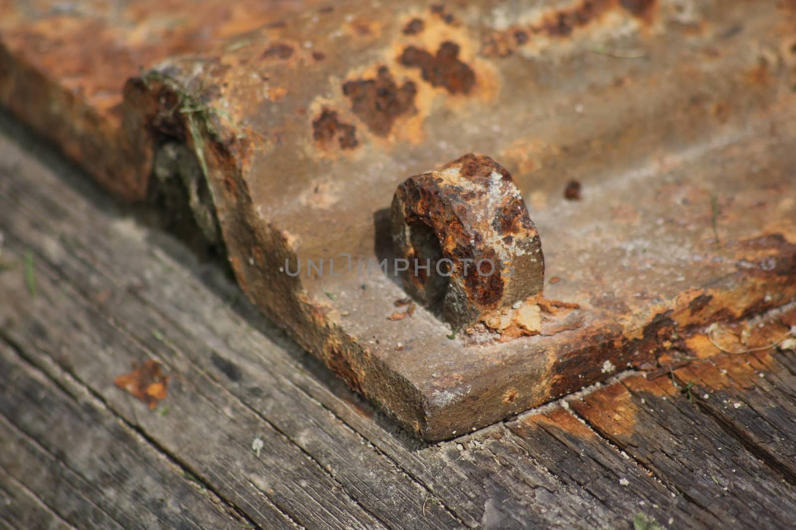 Old railway sleeper with rusty plate by Jannsel