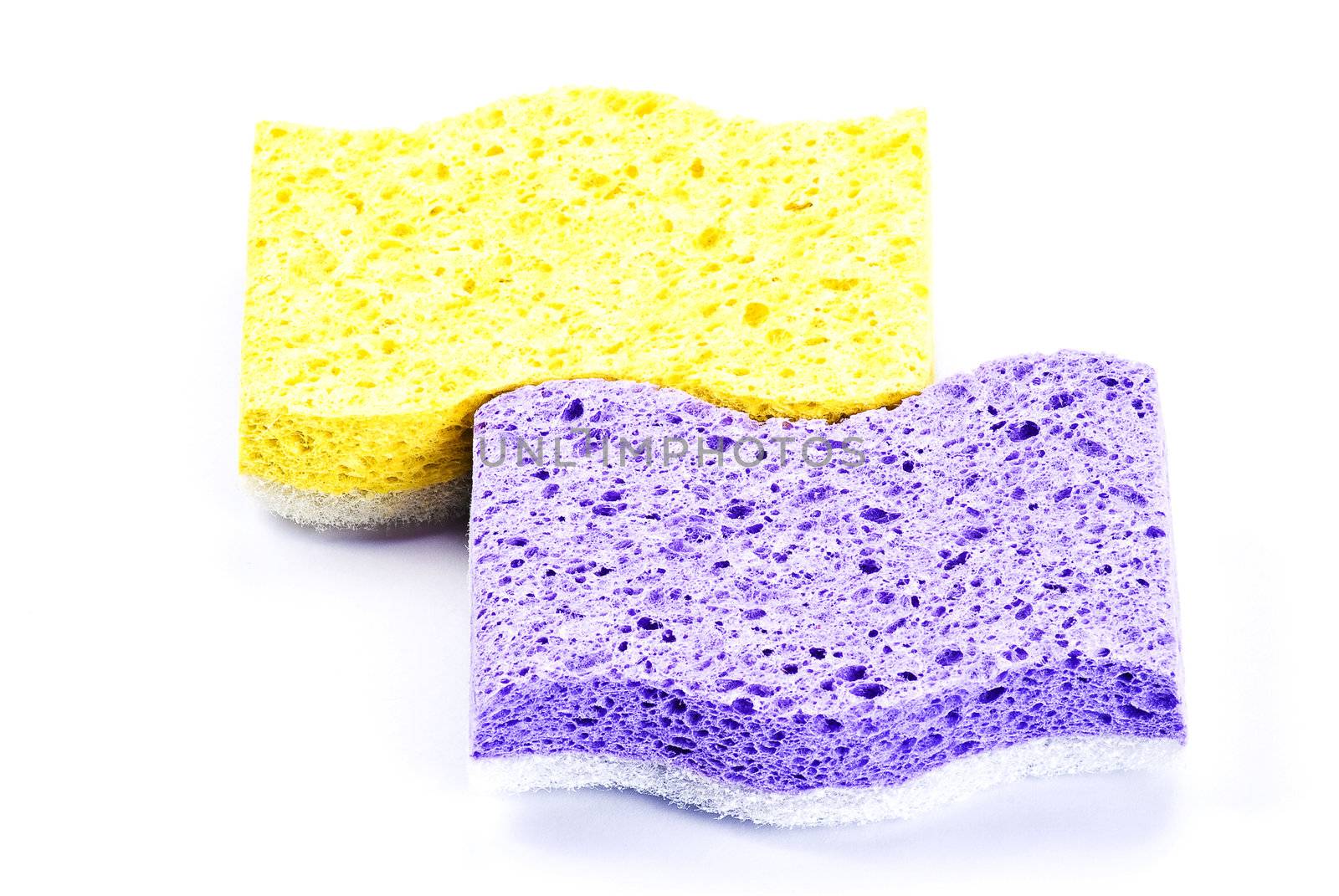 Home care and cleaning sponges over white background