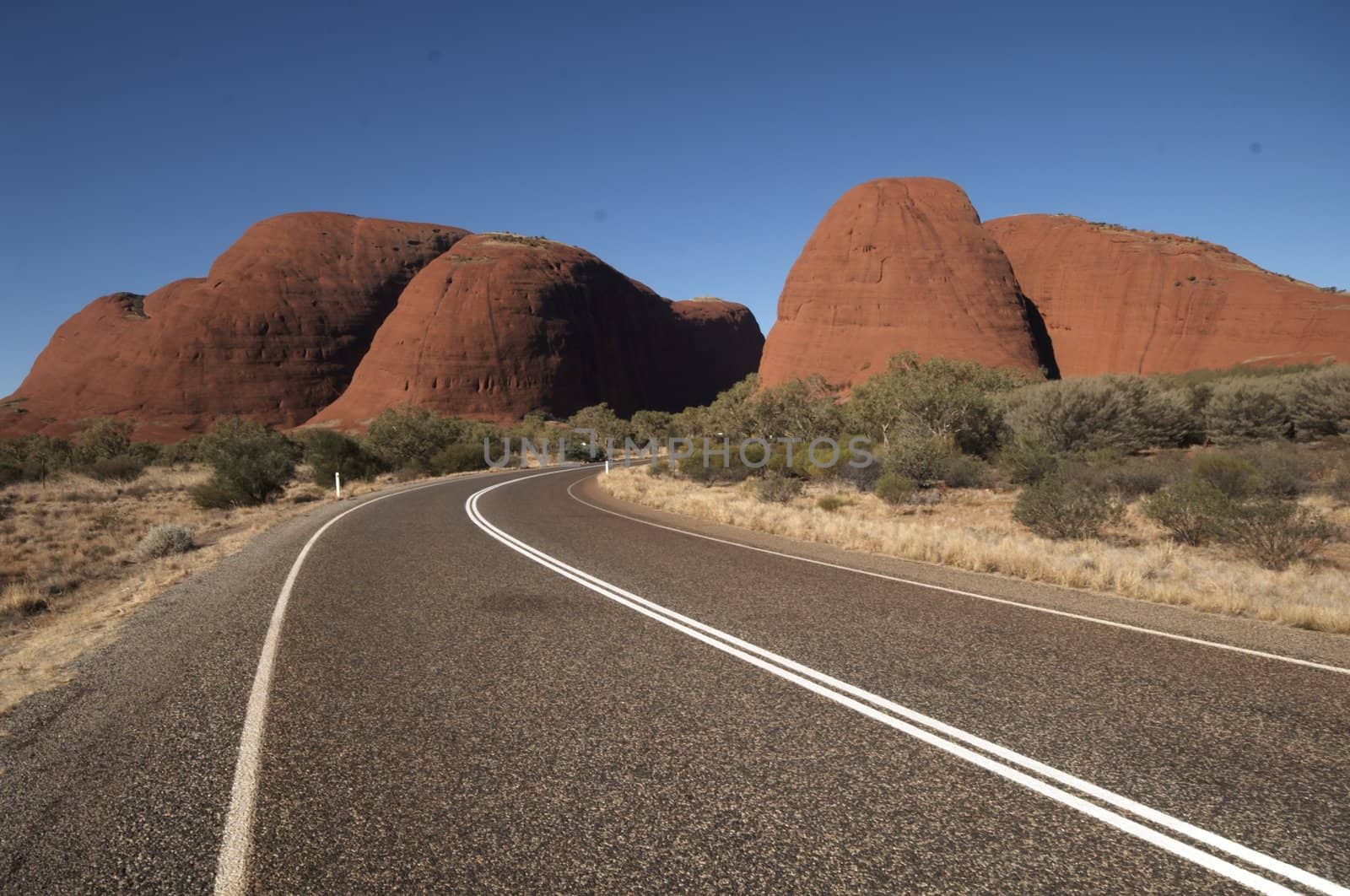 Red domes of the Kata Tjuta rock formation in the Australian desert