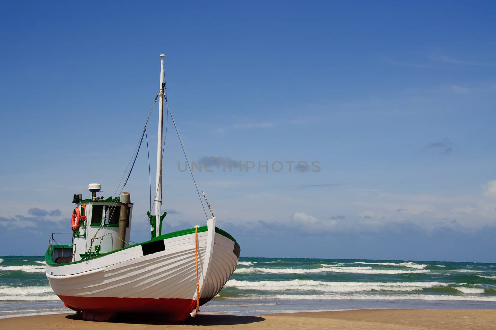 Fishingboat on the beach by GryT