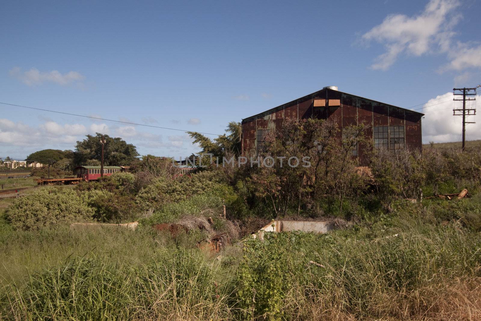 Old abandoned rusty tropical barn.