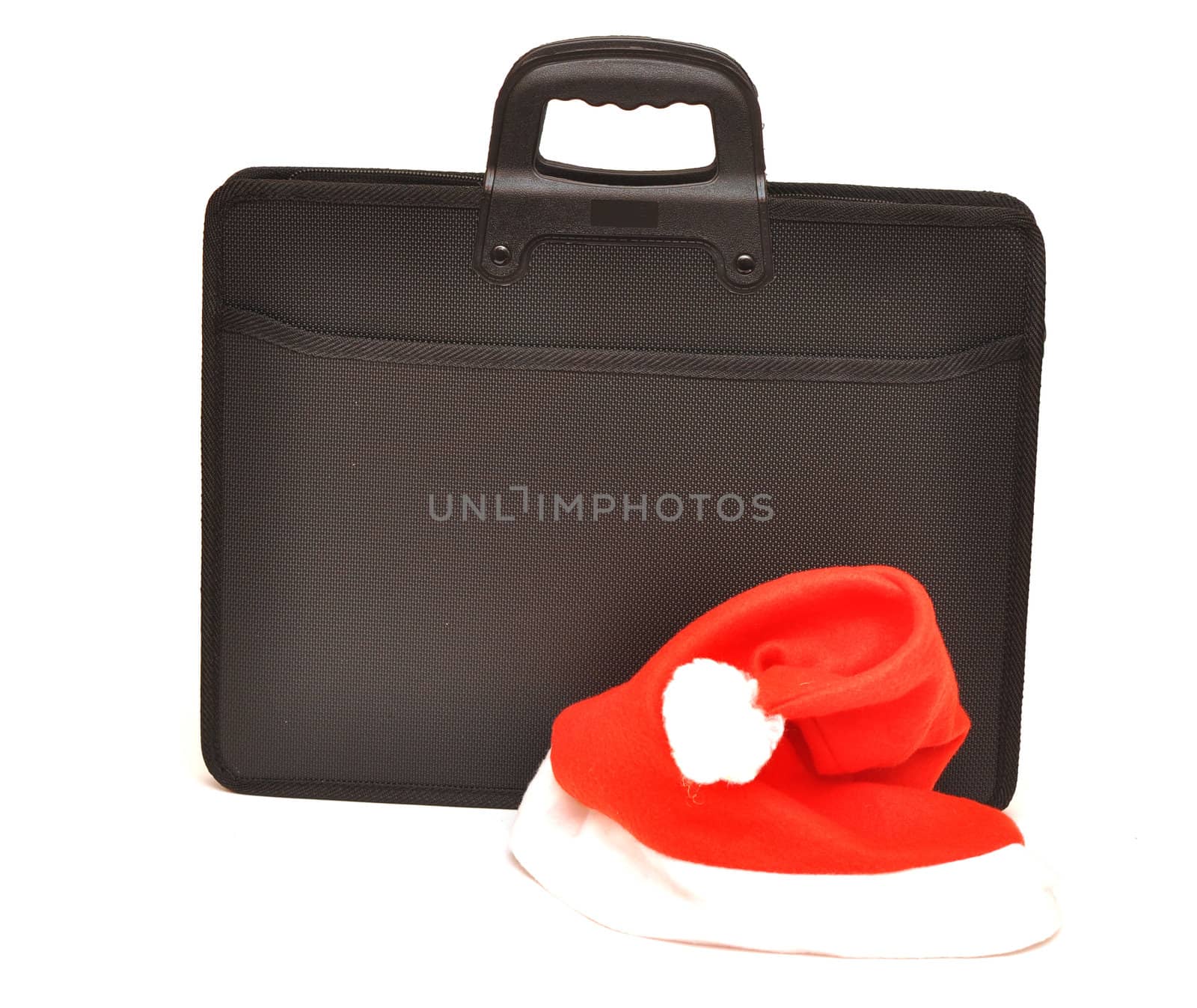 Black business briefcase with Santa's hat isolated on a white background