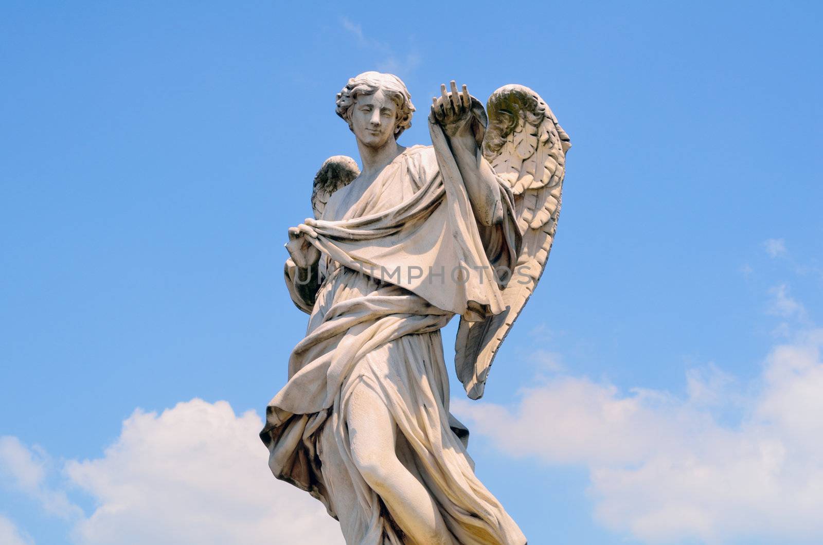 Ancient marble sculpture of angel on the bridge in Rome, Italy
