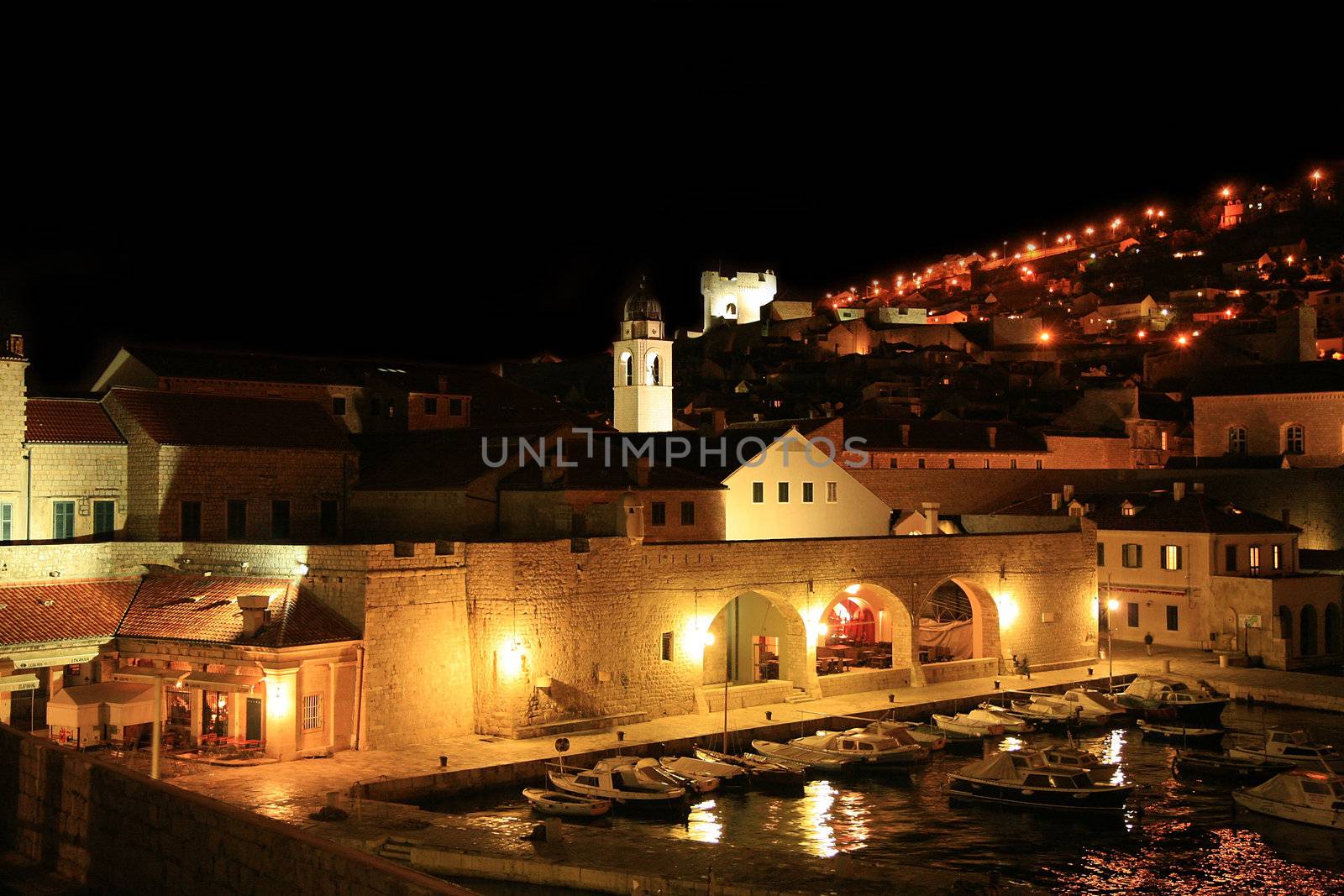 Stari Grad ( Old Town ) and famoust historic harbor in Dubrovnik – Croatia by night.