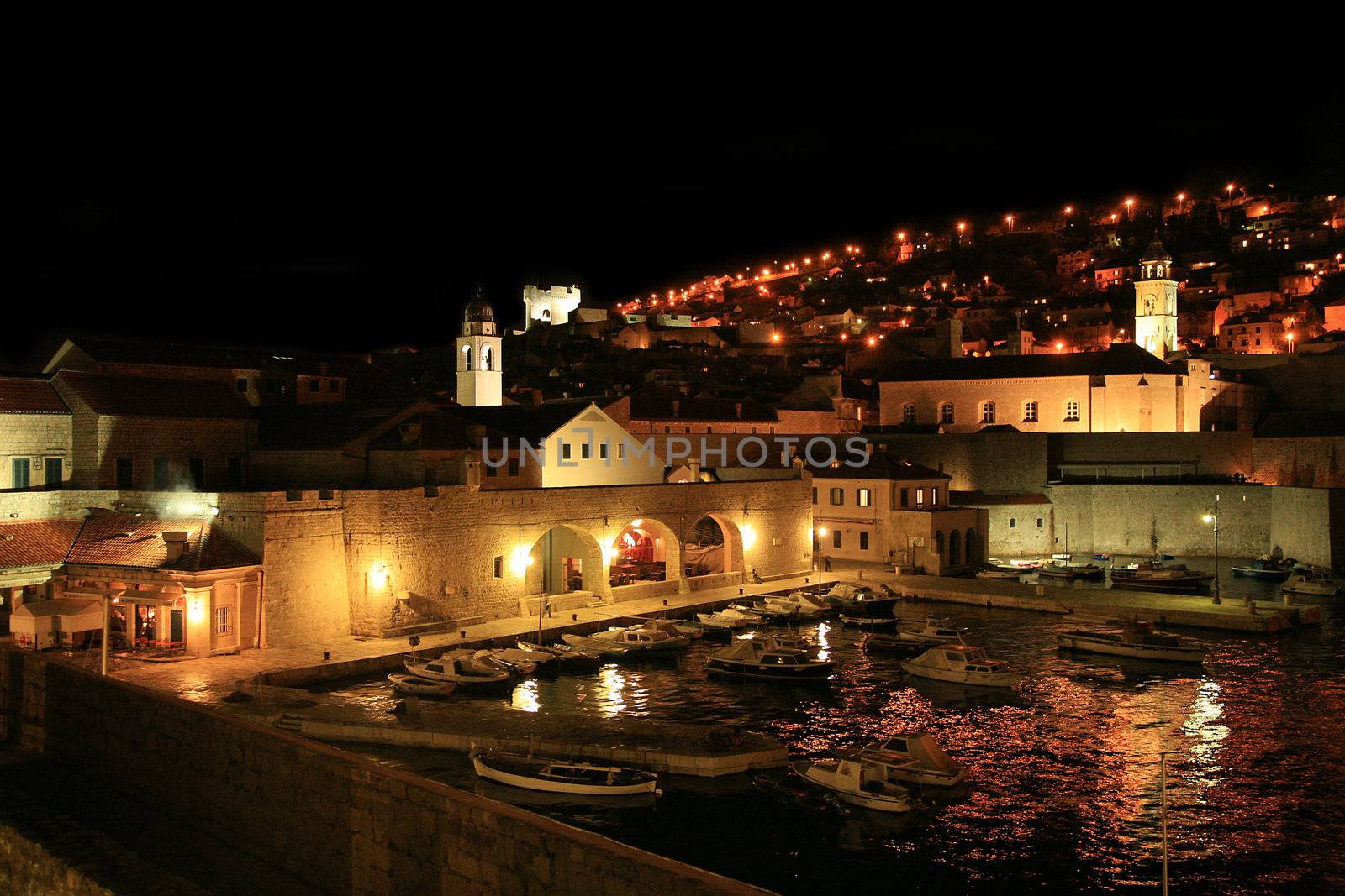 Stari Grad ( Old Town ) and famoust historic harbor in Dubrovnik – Croatia by night.