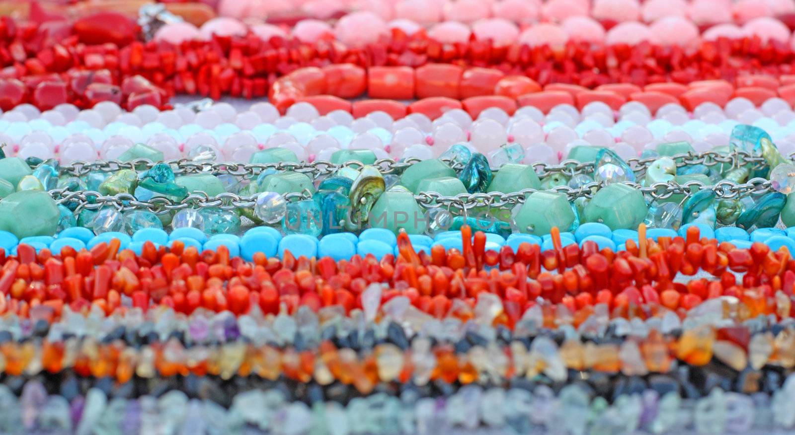 Close up of  different beads made of gemstones