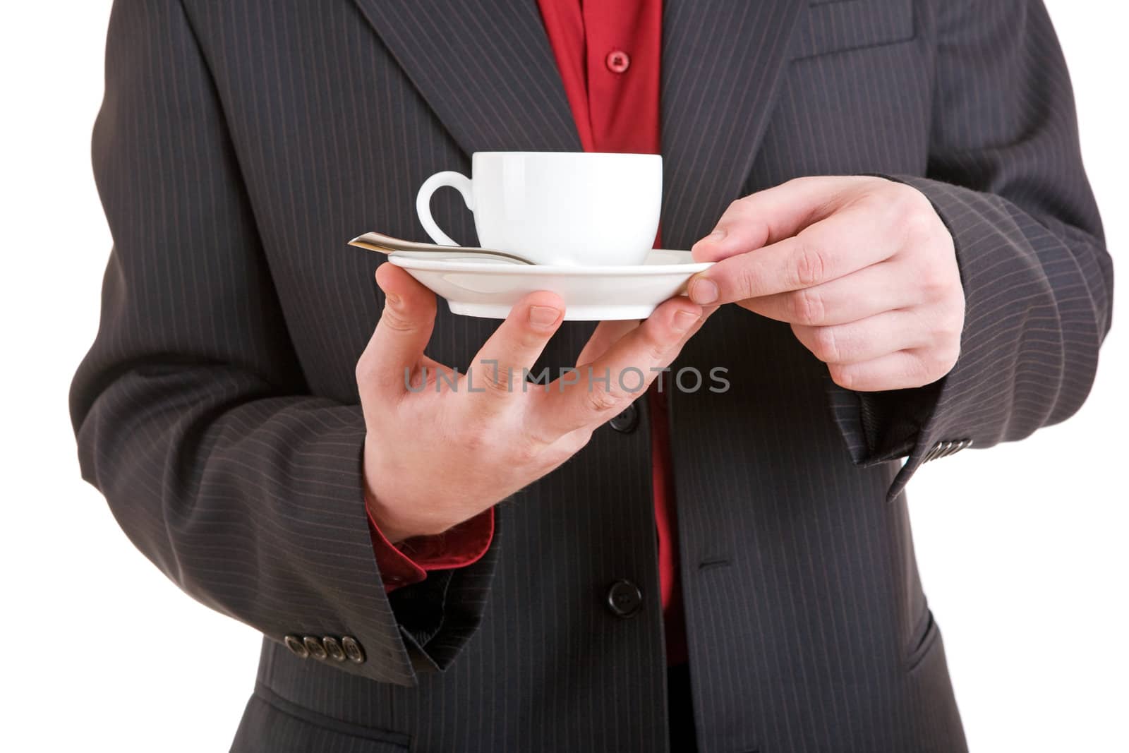 white coffee cup in the hand of the man