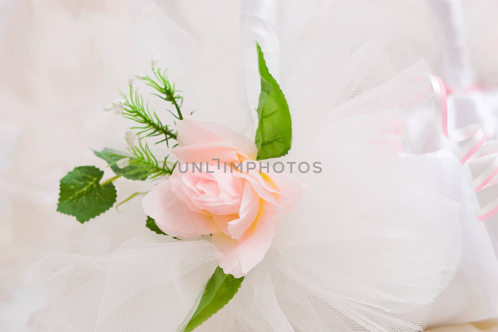 artificial rose flower on the clothing