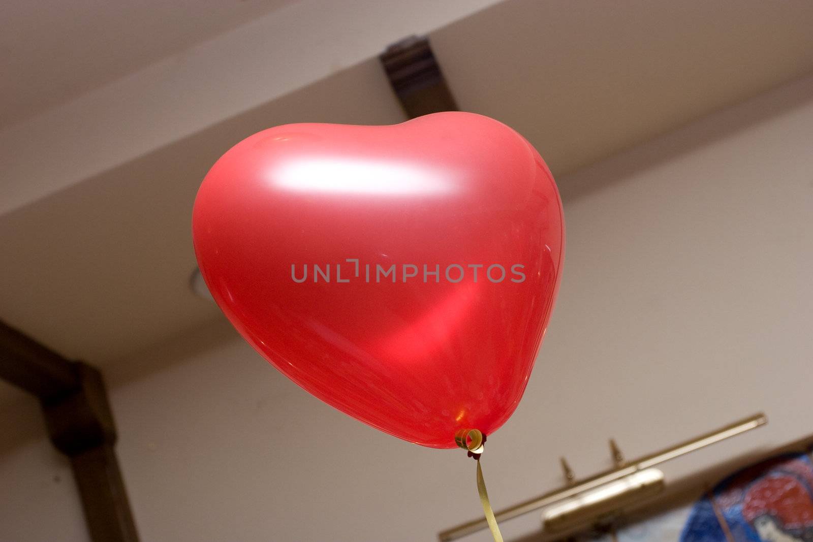 red balloon in form of a heart