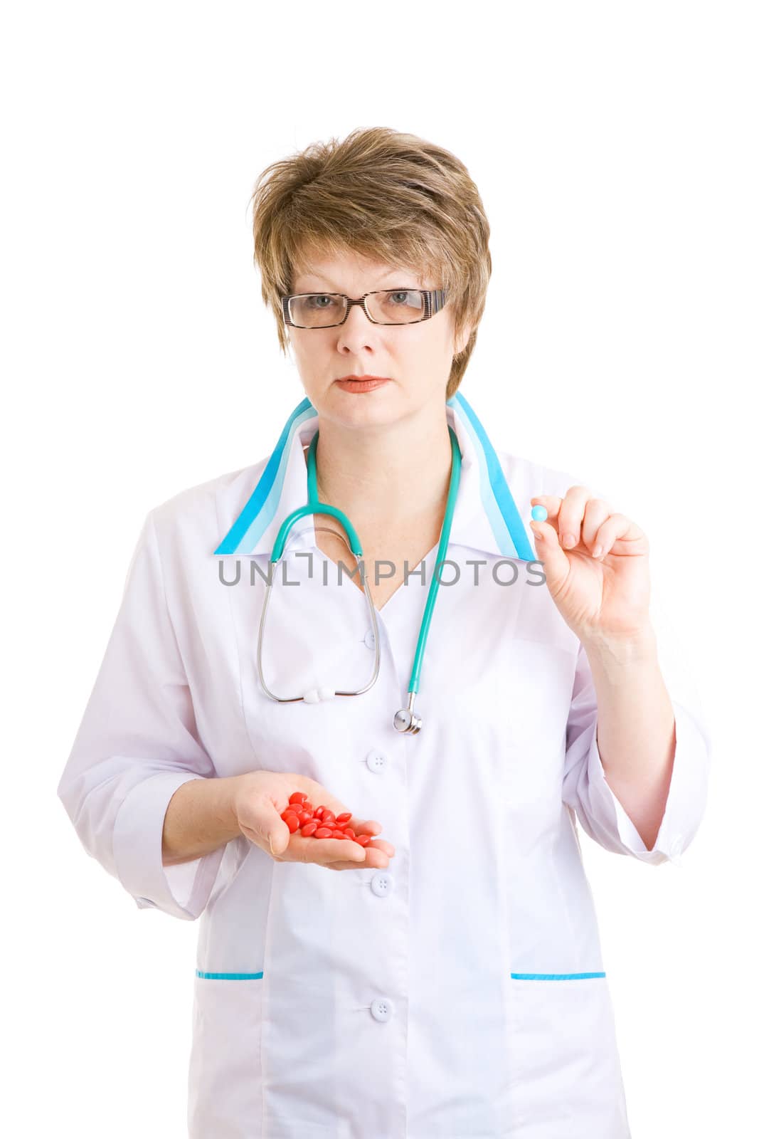doctor with various pills in hands