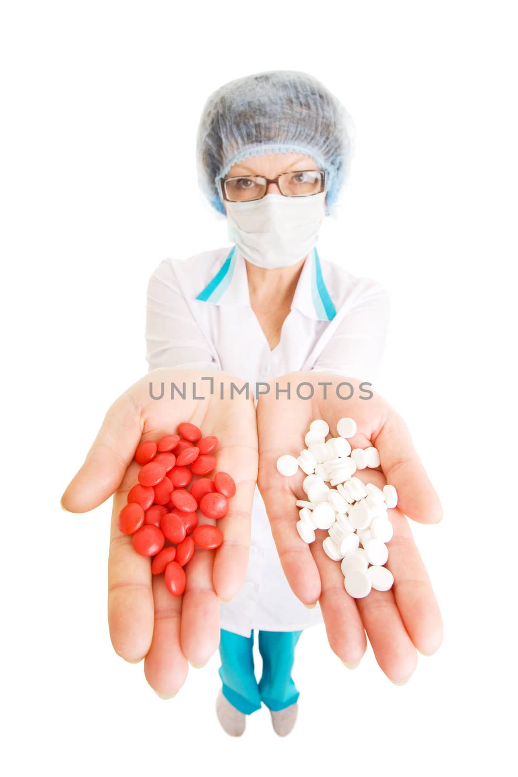 doctor with various pills in hadns