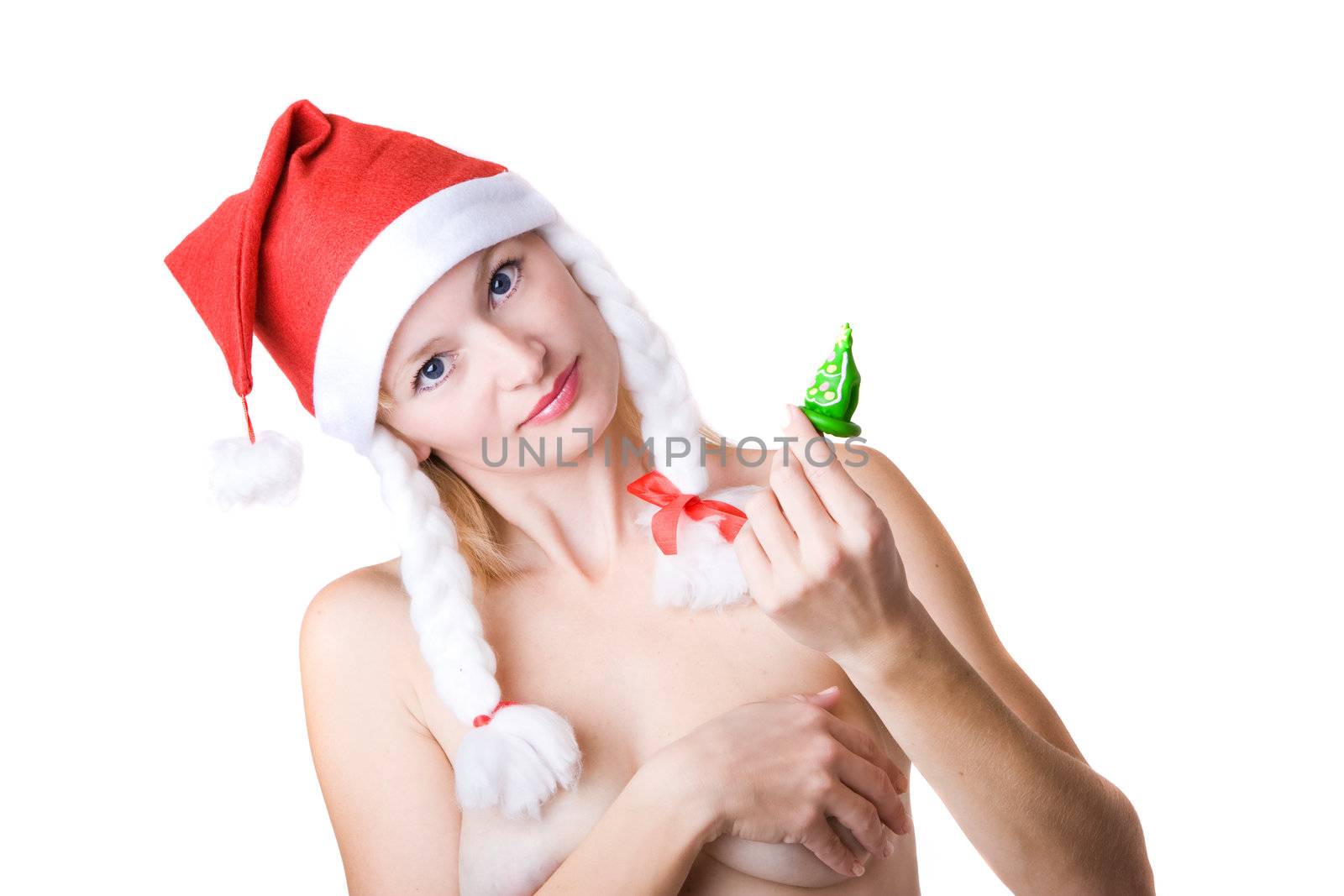 Naked woman in red Christmas cap with contraceptive