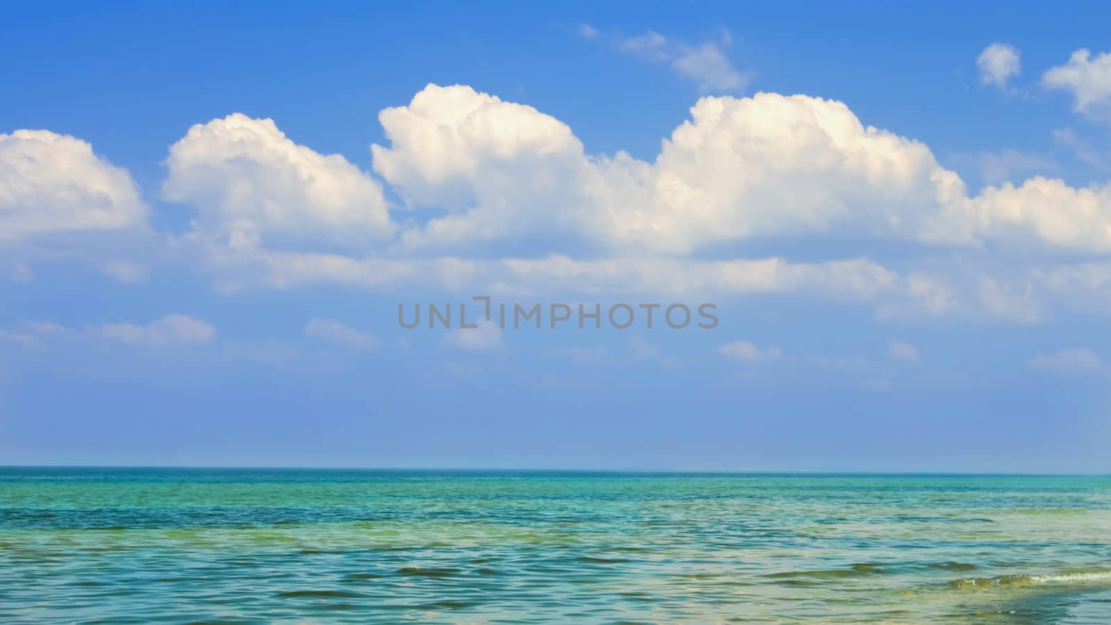 Cloudscape over the sea in fine summer day