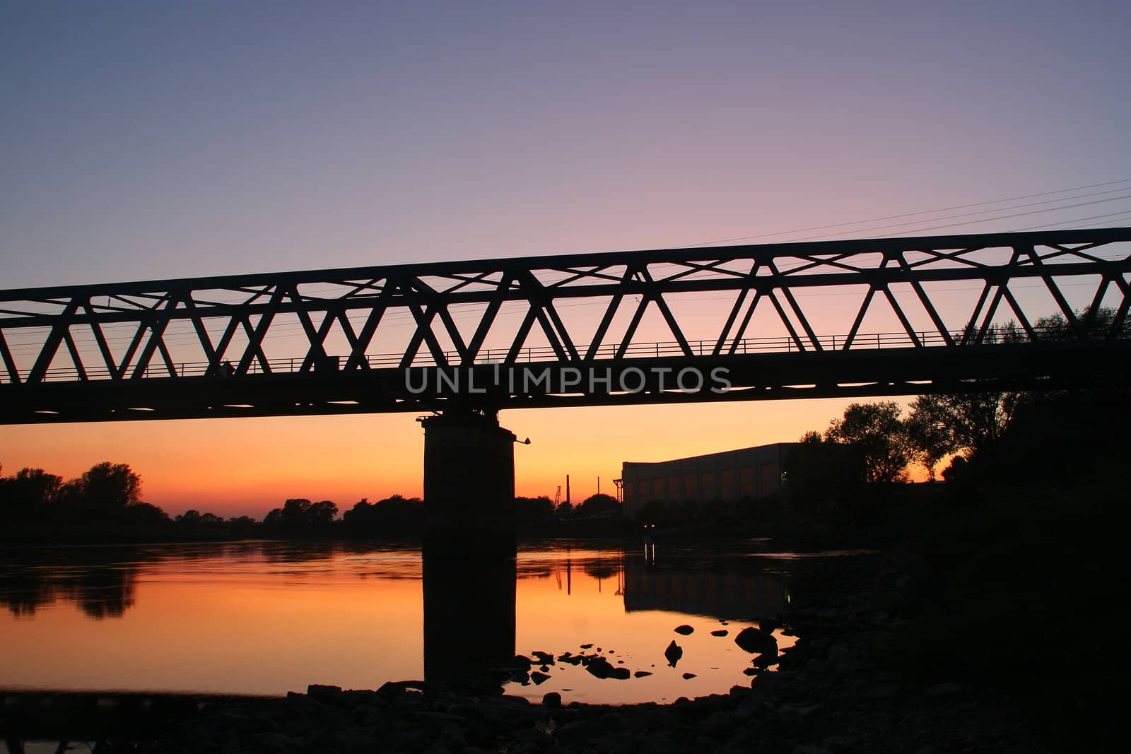 Railway bridge over the Elbe in Dessau-Ro�lau / Saxony-Anhalt / Germany, in the late evening twilight