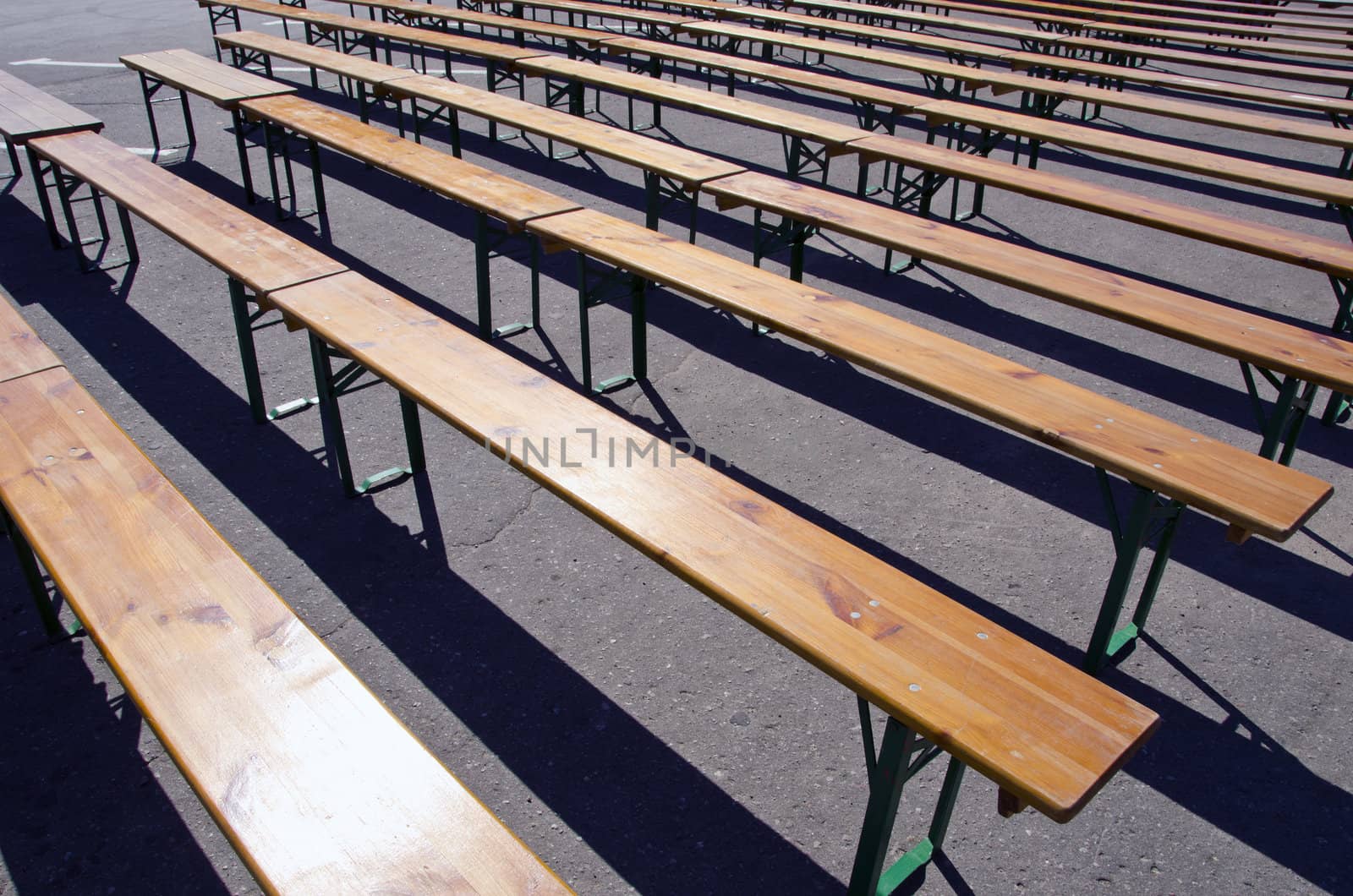 Wooden benches placed in square for meeting. by sauletas