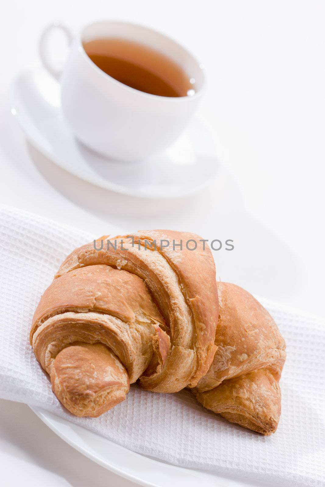 food series: cup of tea and croissant