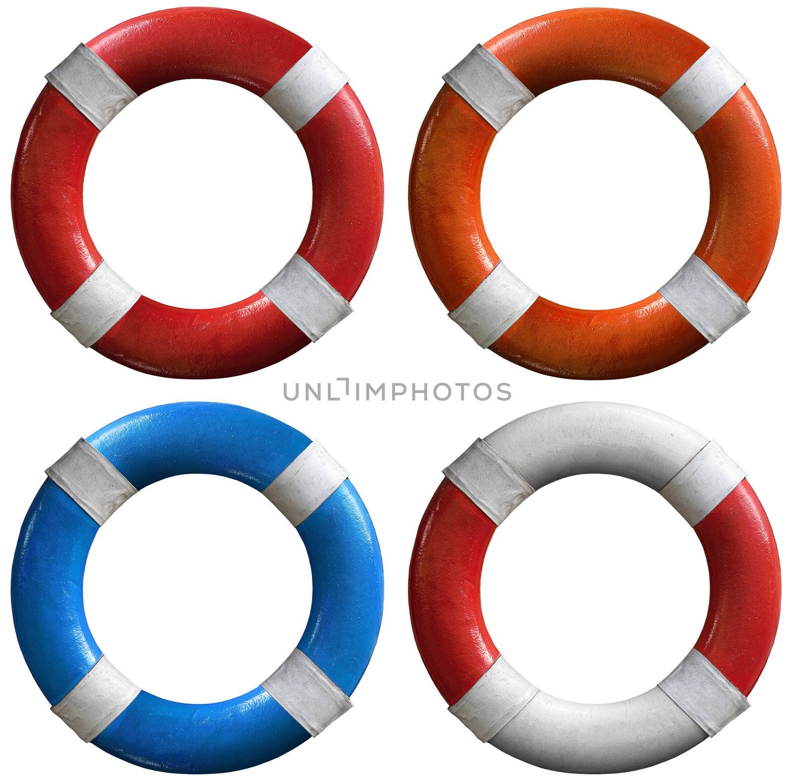 Four life buoys of various colors: red and white, orange and white, blue and white