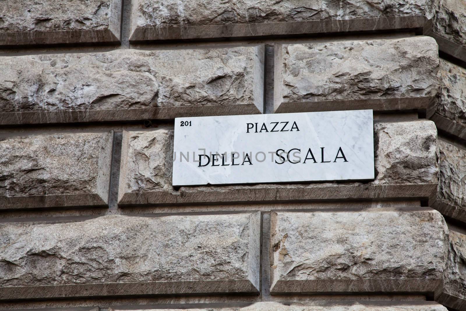 Street sign of famous interesting point in Milan center - Italy