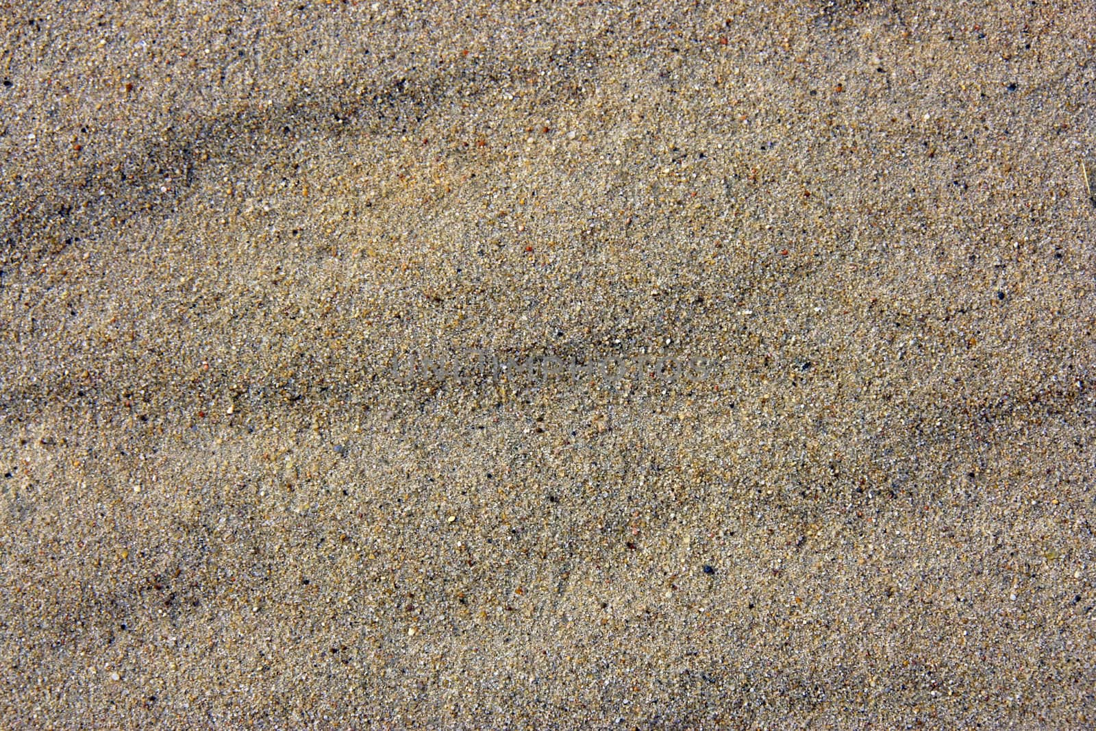 Sand texture as abstract background. Sand pattern.