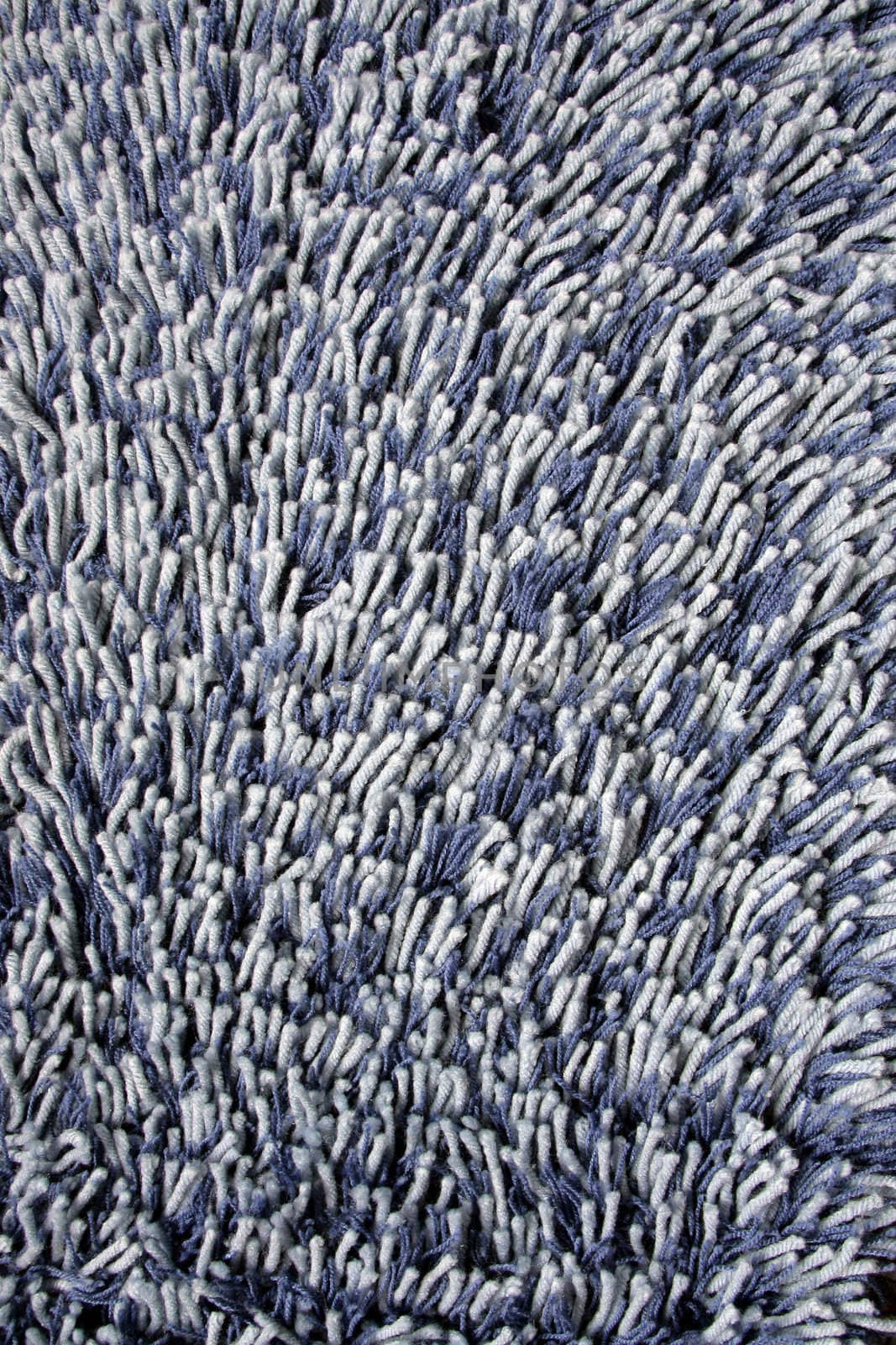 Pile of a white-blue carpet covering