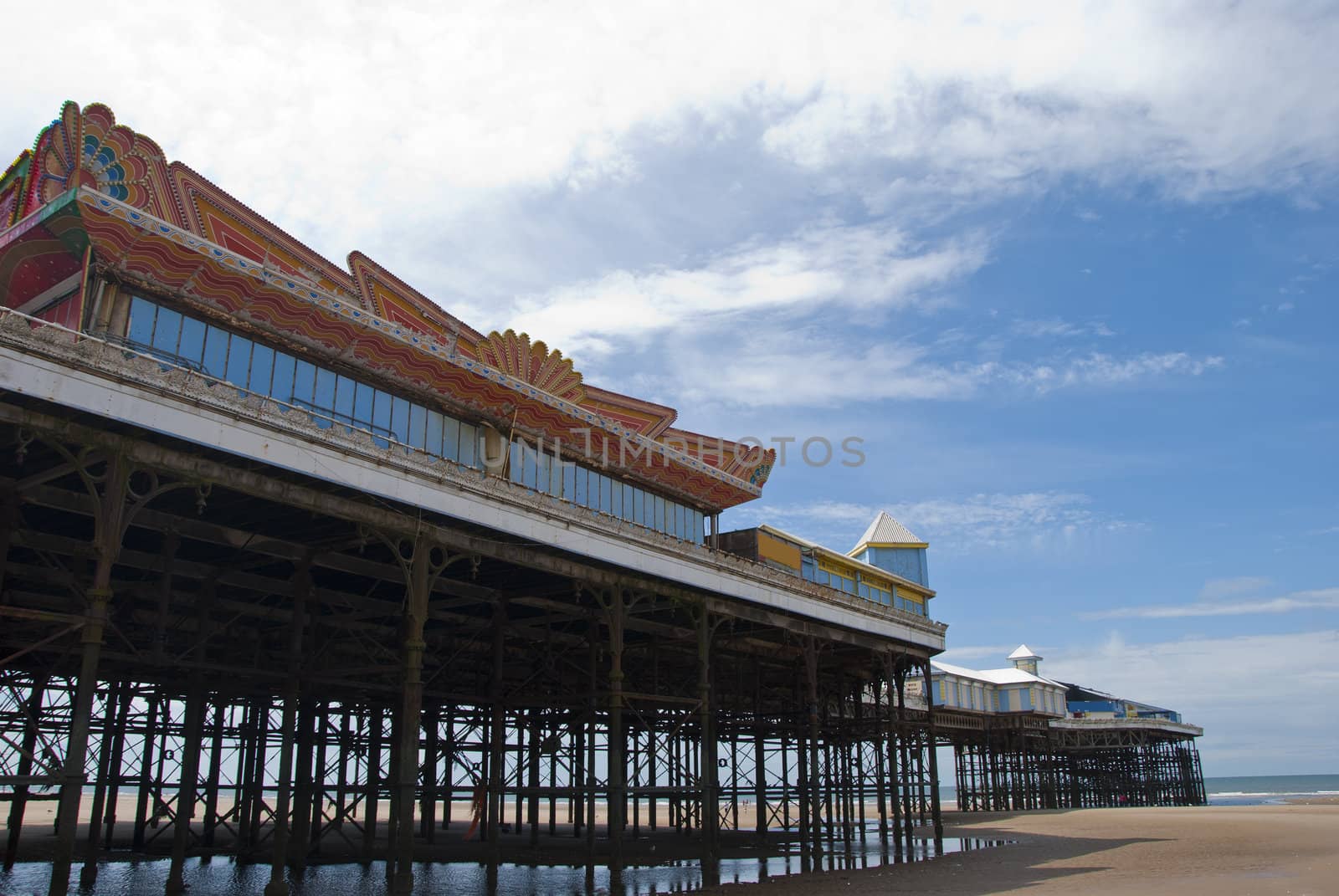 The Victorian Central Pier at Blackpool from the beach looking towards the sea
