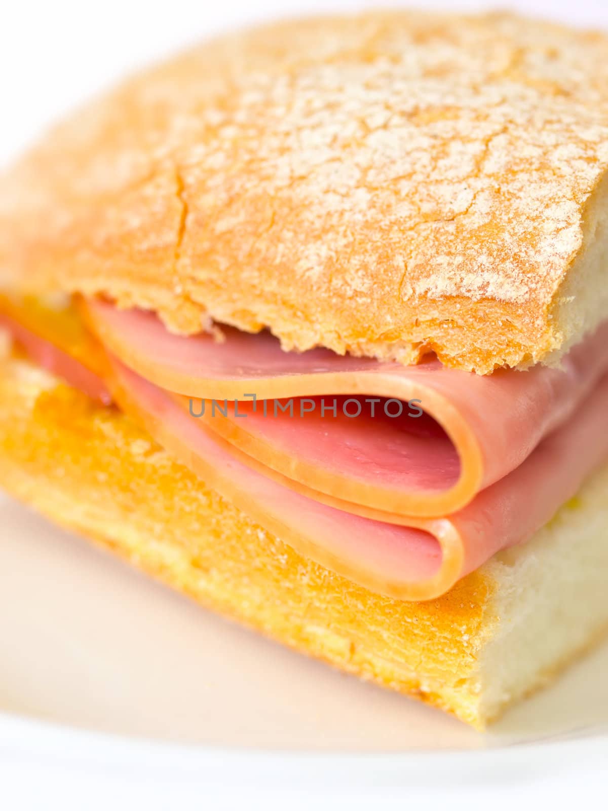 close up of a ham sandwich