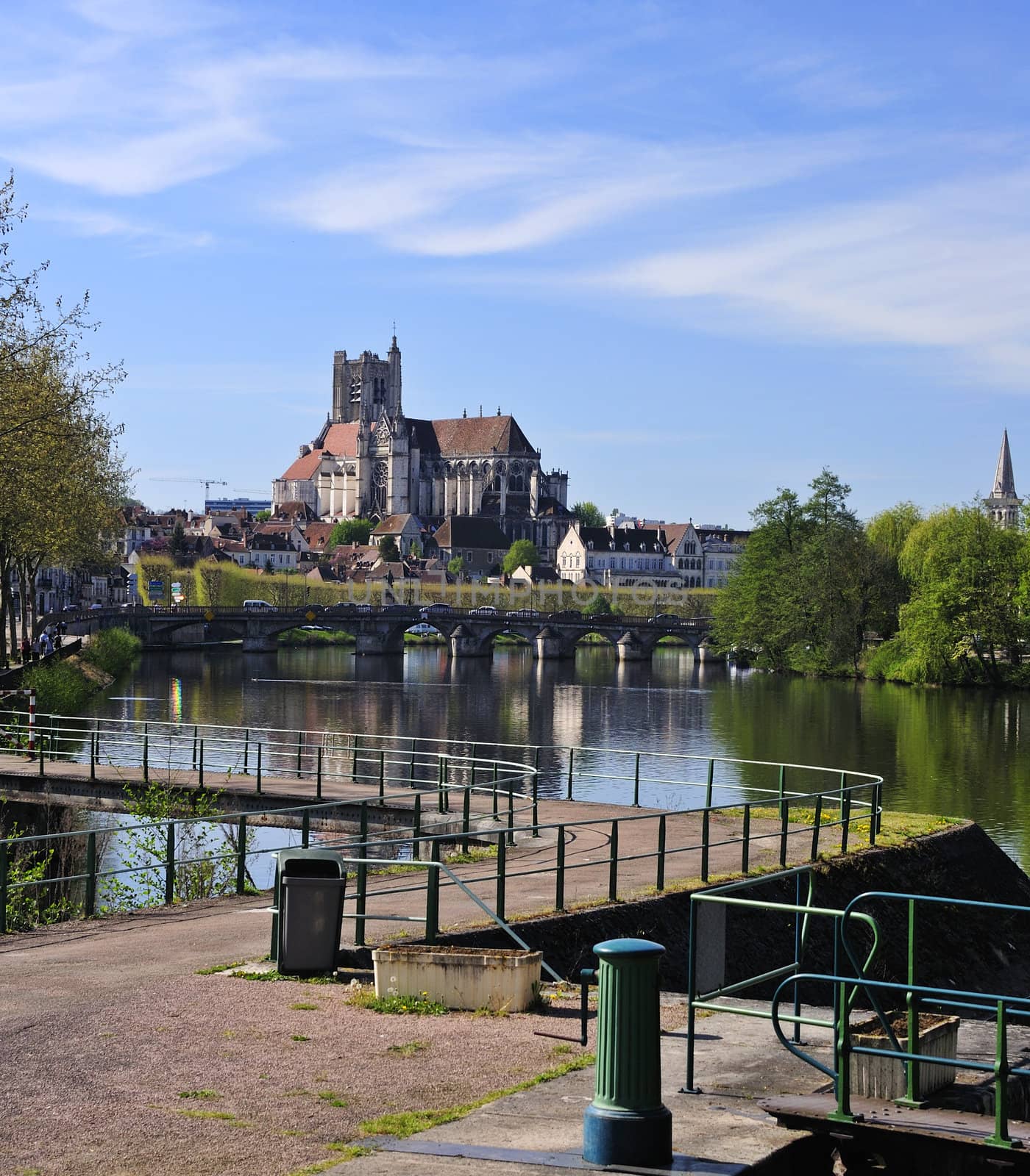 The Cathedral of Saint Etienne at Auxerre, from the Yonne River. Space for text in the sky.
