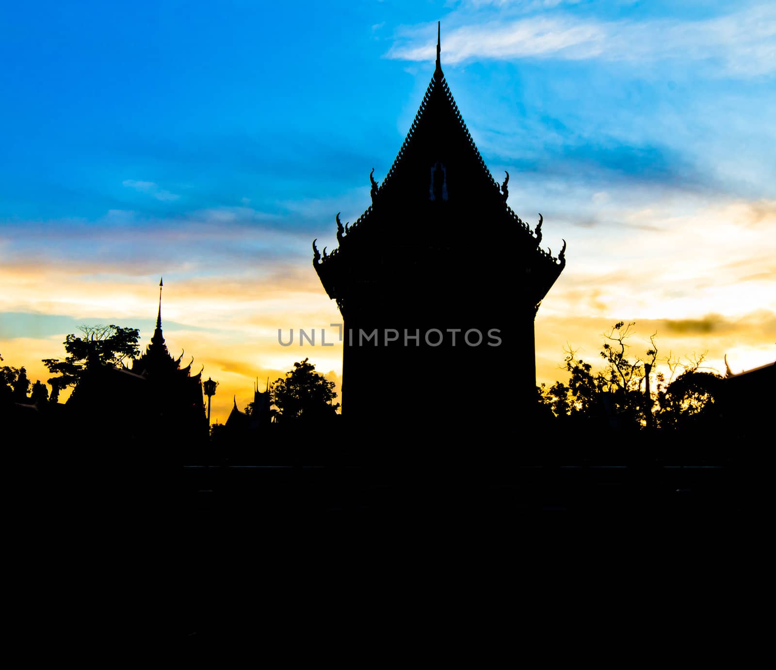 Buddhist temple in Thailand at twilight. by Na8011seeiN