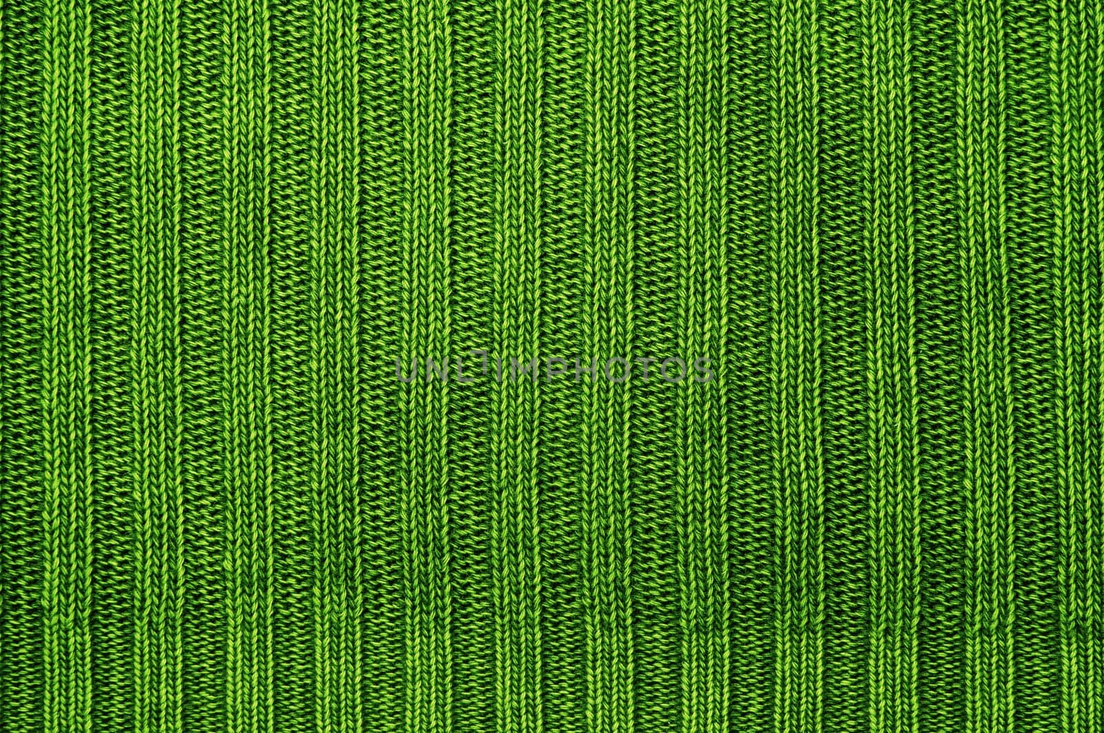 Background a texture a knitted fabric "elastic band" of green color.