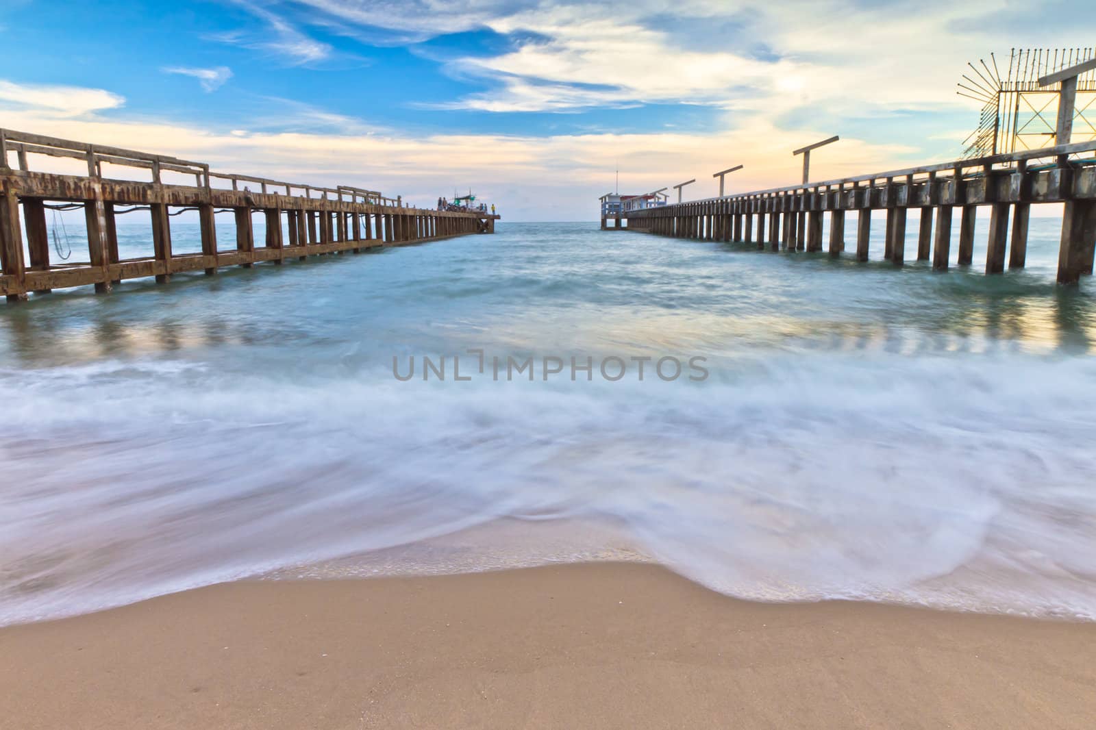 The bridge stretches out to sea in Thailand. by Na8011seeiN